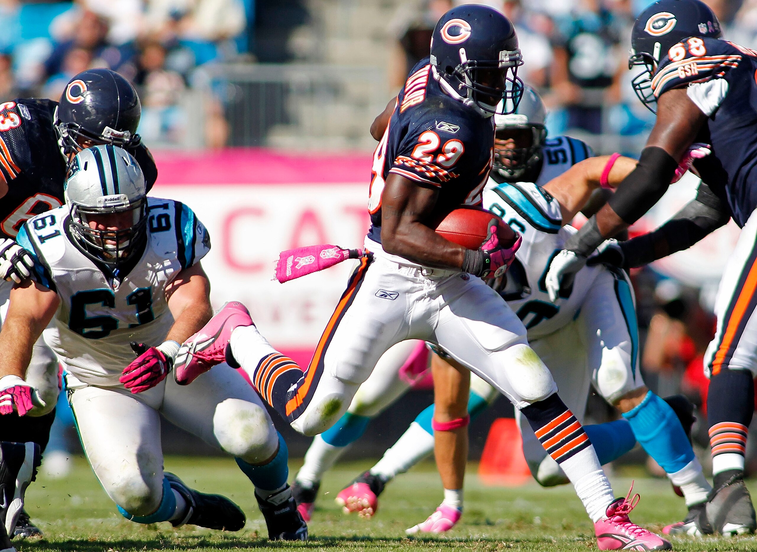 CHARLOTTE, NC - OCTOBER 10: Running back Chester Taylor #29 of the Chicago Bears runs with the ball past defensive tackle Derek Landri #61 of the Carolina Panthers at Bank of America Stadium on October 10, 2010 in Charlotte, North Carolina. (Photo by Geo CHARLOTTE, NC - OCTOBER 10: Running back Chester Taylor #29 of the Chicago Bears runs with the ball past defensive tackle Derek Landri #61 of the Carolina Panthers at Bank of America Stadium on October 10, 2010 in Charlotte, North Carolina. (Photo by Geo