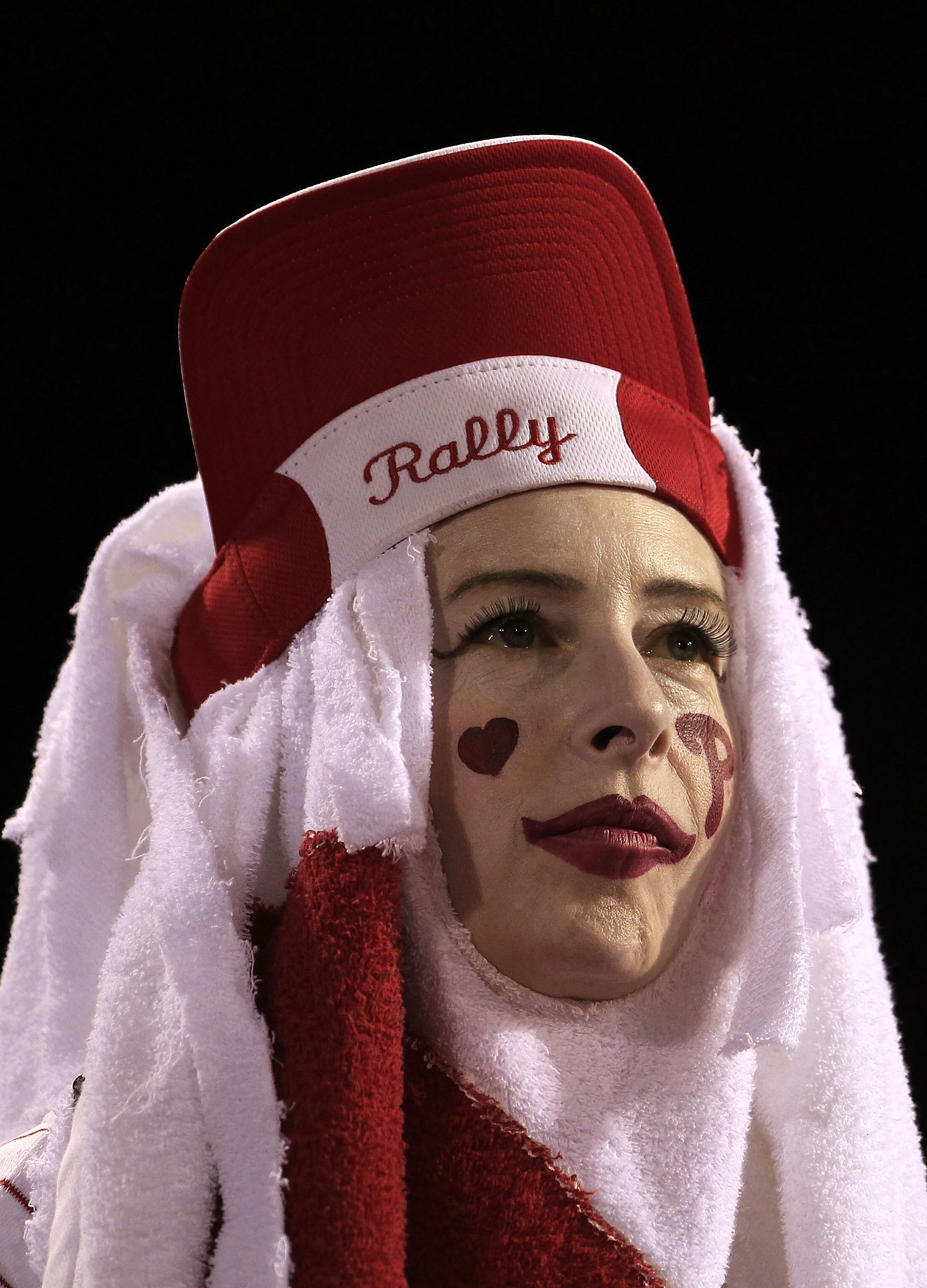 PHILADELPHIA - OCTOBER 08: A Philadelphia Phillies fan watches the game against the Cincinnati Reds in game 2 of NLDS at Citizens Bank Park on October 8, 2010 in Philadelphia, Pennsylvania. The Phillies defeated the Reds 7-4.  (Photo by Chris Trotman/Gett