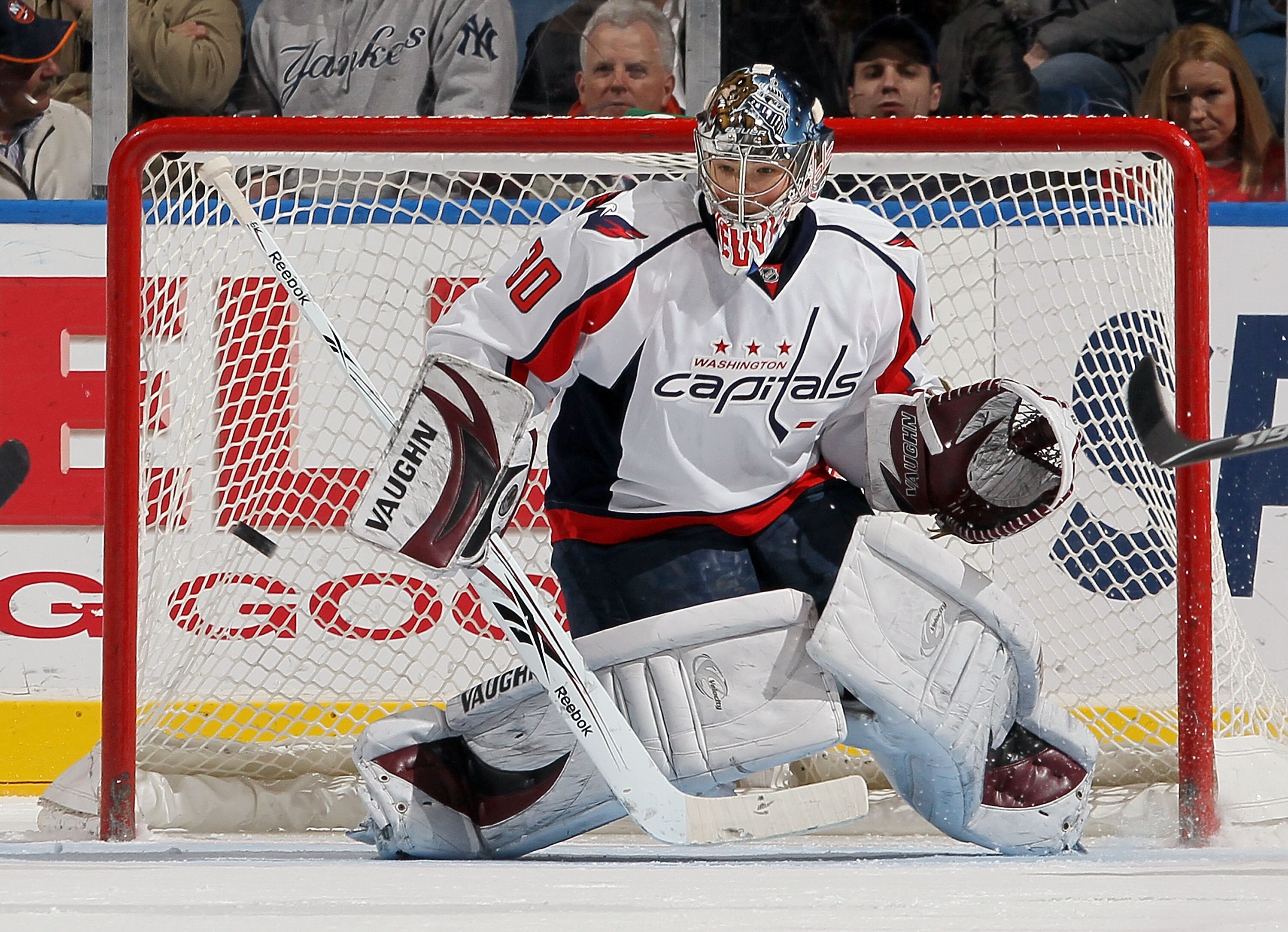 UNIONDALE, NY - JANUARY 26:  Michal Neuvirth #30 of the Washington Capitals makes a save against the New York Islanders on January 26, 2010 at Nassau Coliseum in Uniondale, New York.  (Photo by Jim McIsaac/Getty Images)