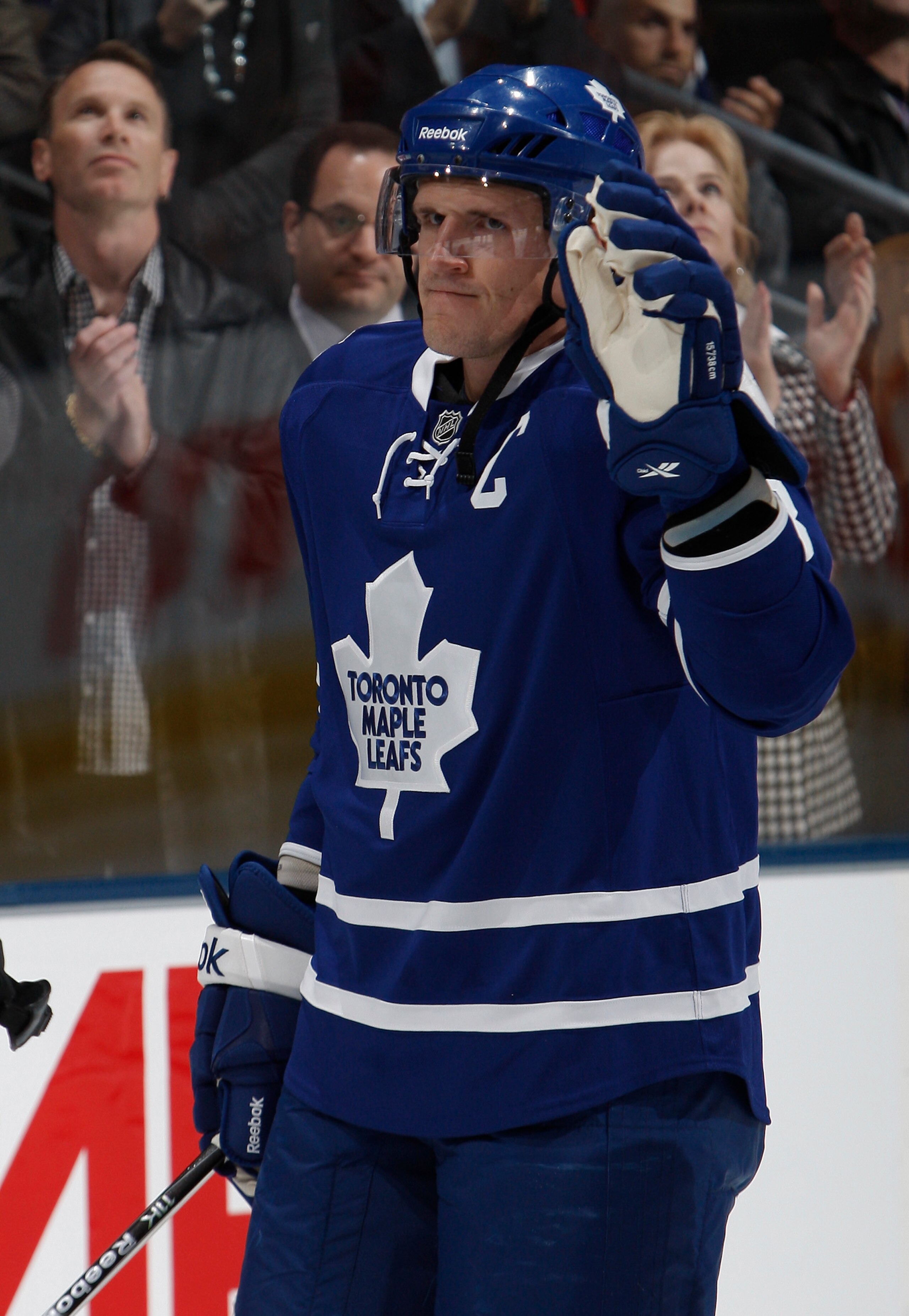 TORONTO - OCTOBER 7: Dion Phaneuf #3  of the Toronto Maple Leafs waves as he is introduced as Captain before playing the Montreal Canadiens during a regular season NHL game against the Toronto Maple Leafs at the Air Canada Centre October 7, 2010 in Toront