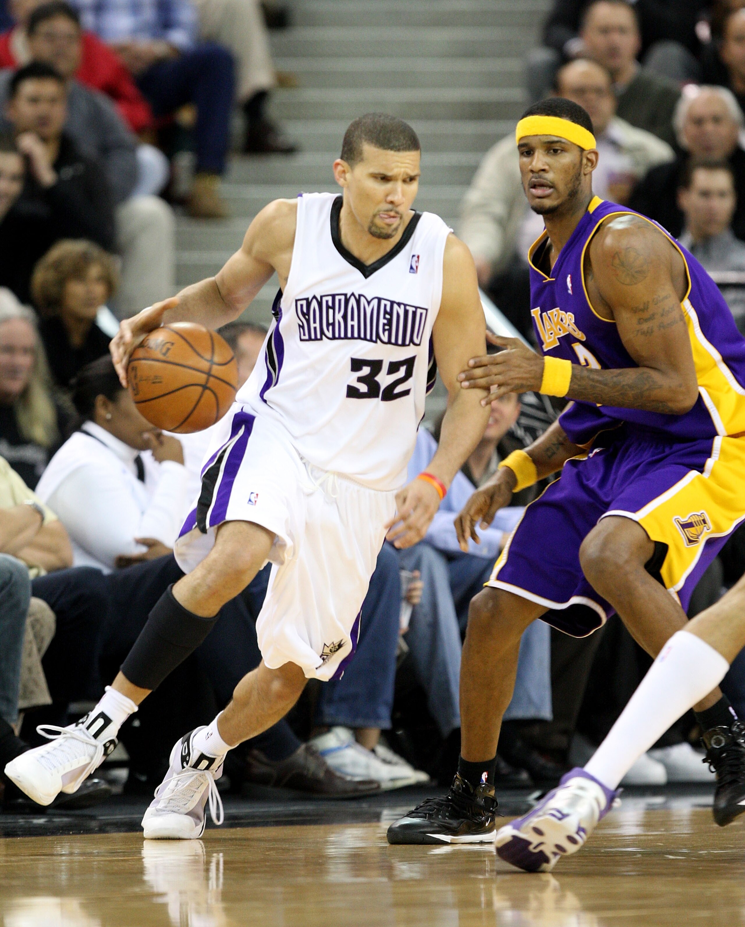 SACRAMENTO, CA - DECEMBER 09:  Francisco Garcia #32 of the Sacramento Kings drives against Trevor Ariza #3 of the Los Angeles Lakers during an NBA game on December 9, 2008 at ARCO Arena in Sacramento, California. NOTE TO USER: User expressly acknowledges 