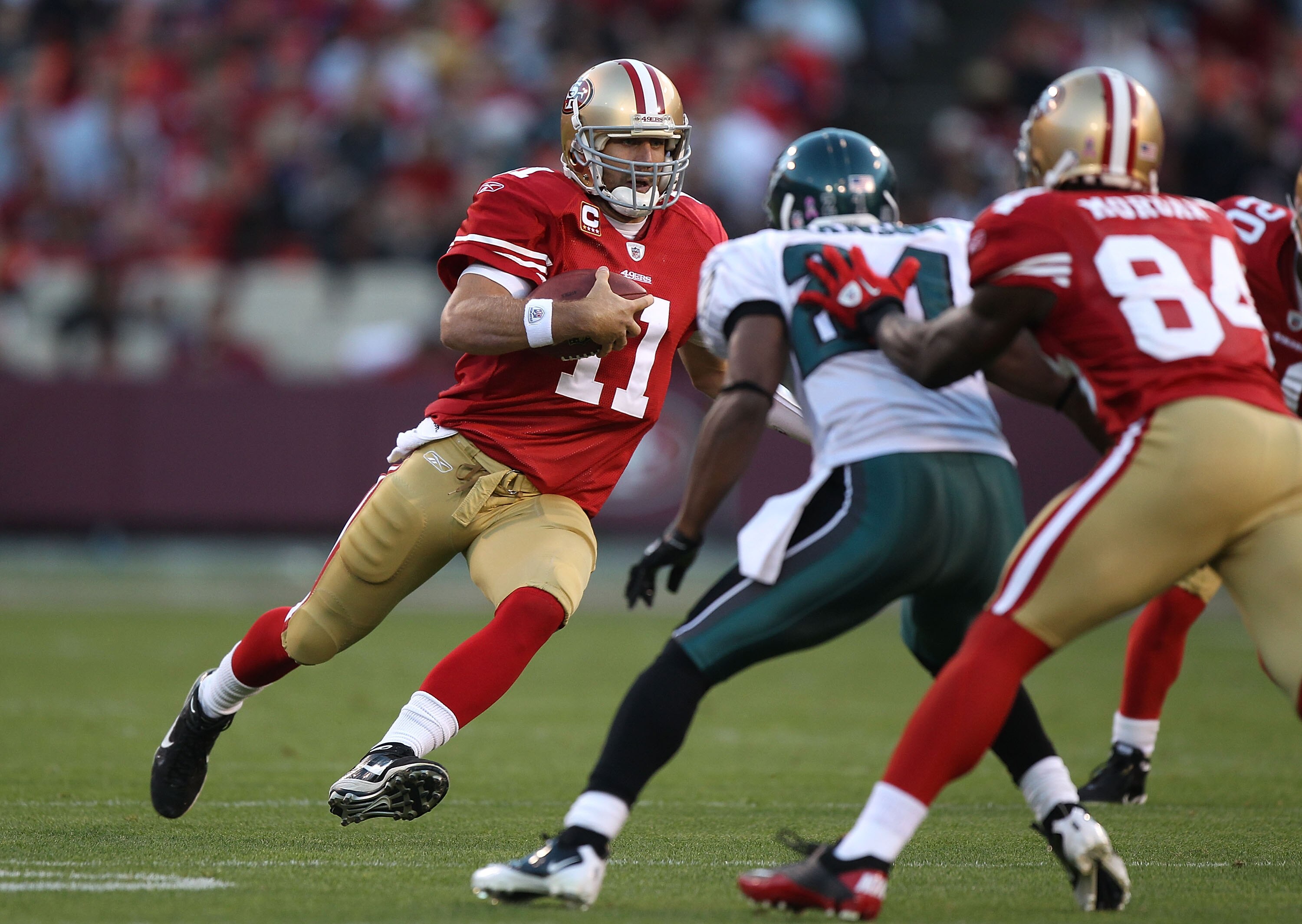 SAN FRANCISCO - OCTOBER 10:  Alex Smith #11 of the San Francisco 49ers runs against the Philadelphia Eagles during an NFL game at Candlestick Park on October 10, 2010 in San Francisco, California.(Photo by Jed Jacobsohn/Getty Images)