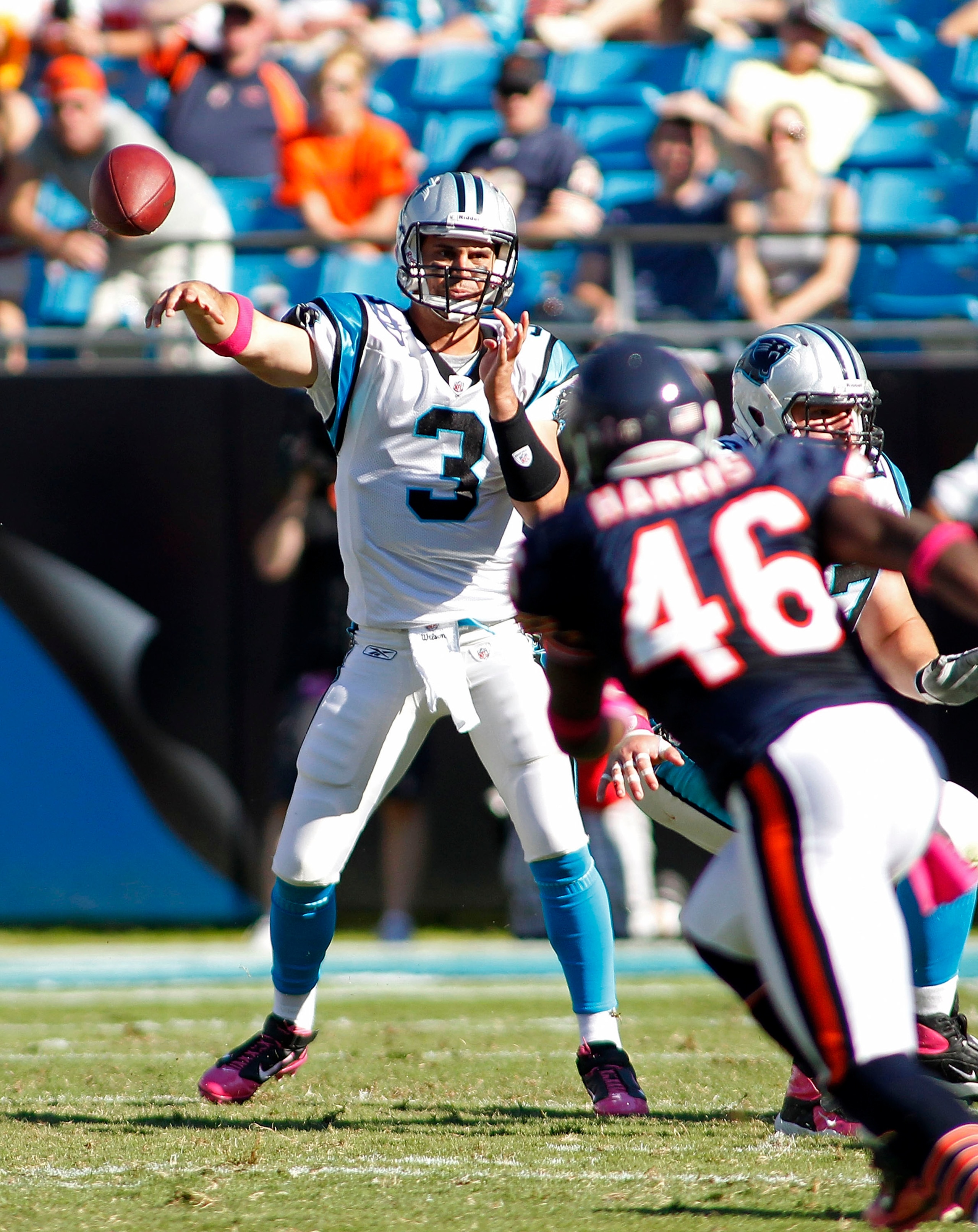 CHARLOTTE, NC - OCTOBER 10: Quarterback Matt Moore #3 of the Carolina Panthers throws the ball as safety Chris Harris #46 of the Chicago Bears defends at Bank of America Stadium on October 10, 2010 in Charlotte, North Carolina.  (Photo by Geoff Burke/Gett