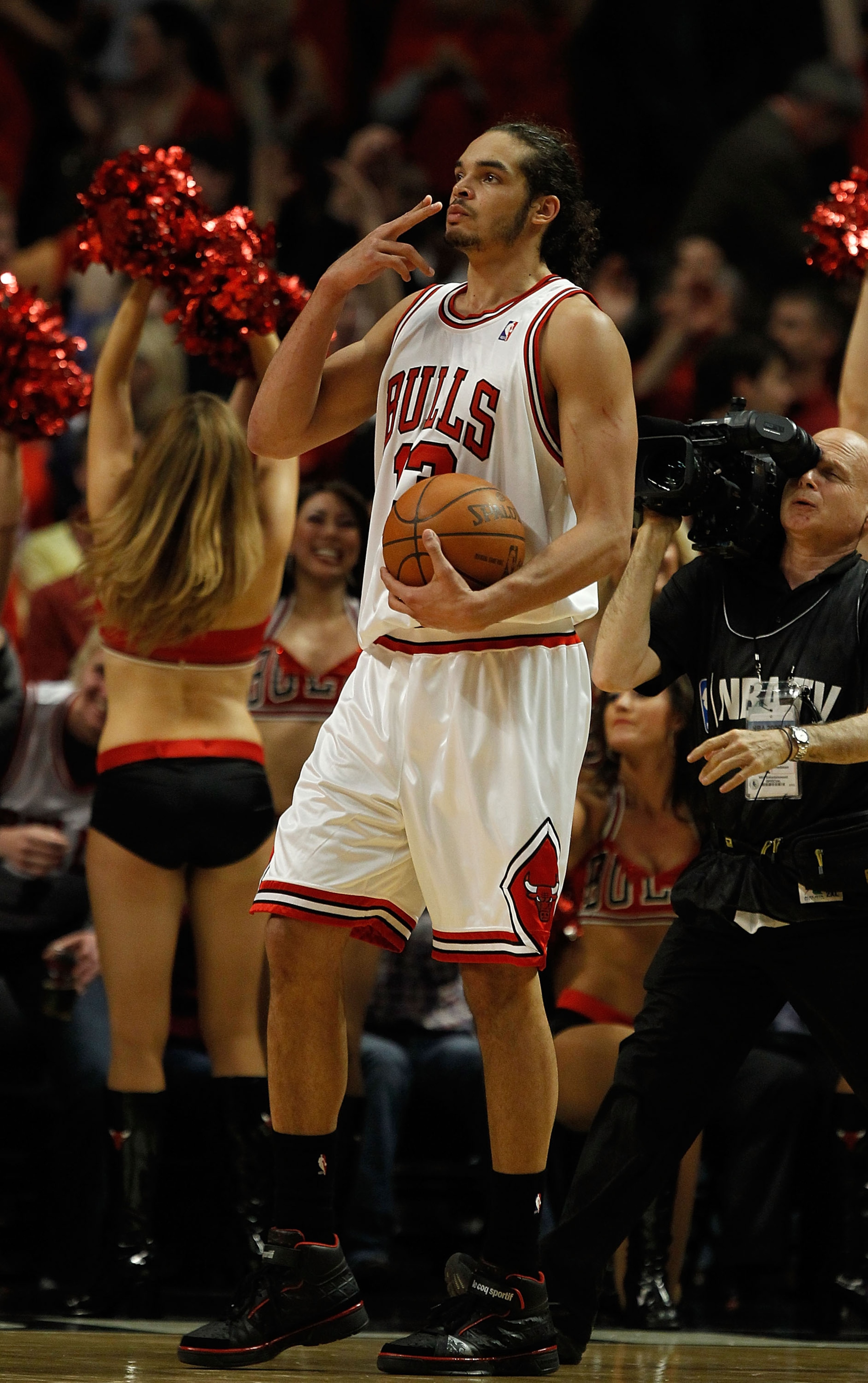 CHICAGO - APRIL 22: Joakim Noah #13 of the Chicago Bulls blows a kiss to fans as he celebrates a win over the Cleveland Cavaliers in Game Three of the Eastern Conference Quarterfinals during the 2010 NBA Playoffs at the United Center on April 22, 2010 in