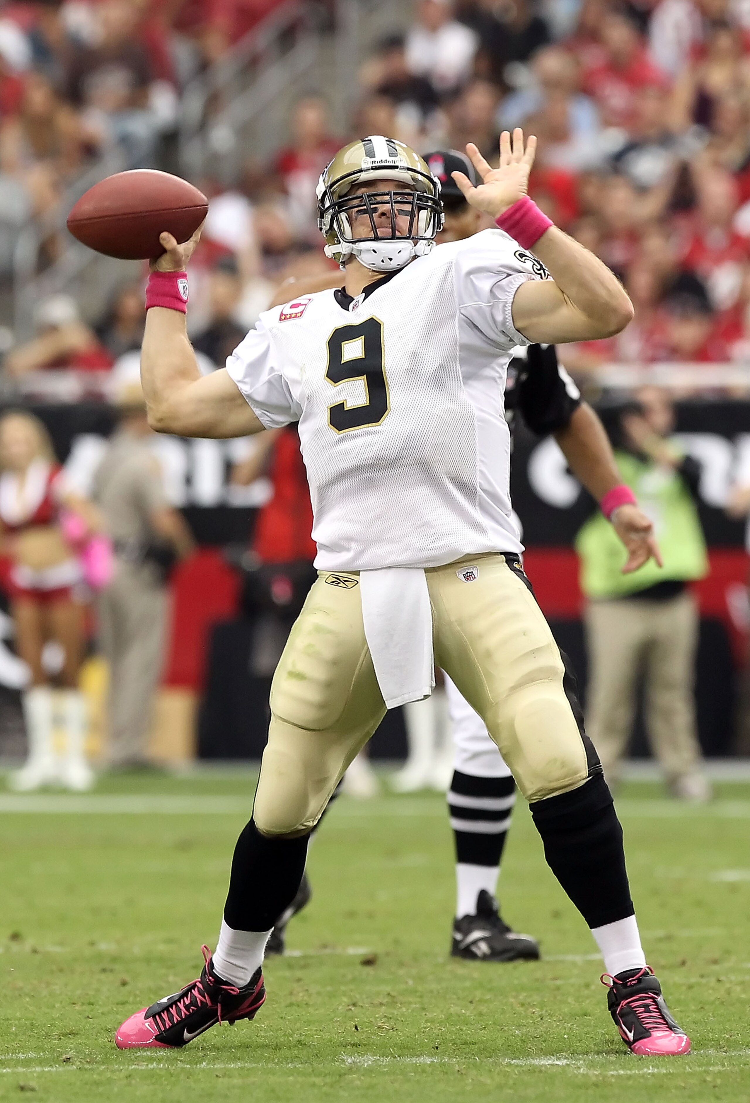 GLENDALE, AZ - OCTOBER 10: Quarterback Drew Brees #9 of the New Orleans Saints throws a pass during the NFL game against the Arizona Cardinals at the University of Phoenix Stadium on October 10, 2010 in Glendale, Arizona. The Cardinals defeated the Saint GLENDALE, AZ - OCTOBER 10: Quarterback Drew Brees #9 of the New Orleans Saints throws a pass during the NFL game against the Arizona Cardinals at the University of Phoenix Stadium on October 10, 2010 in Glendale, Arizona. The Cardinals defeated the Saint