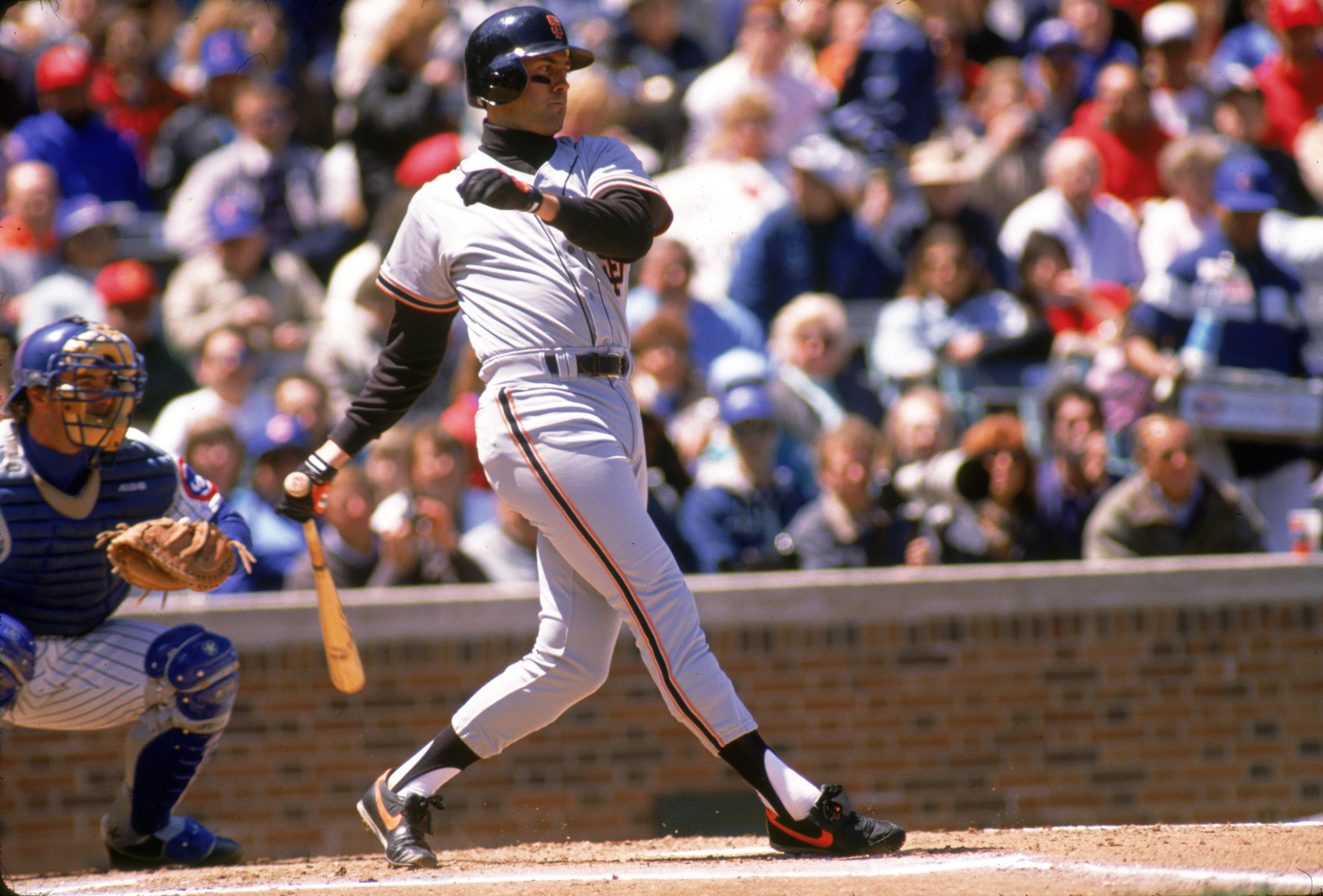 CHICAGO - 1989:  Will Clark #22 of the San Francisco Giants swings during a 1989 season game against the Chicago Cubs at Wrigley Field in Chicago, Illinois. (Photo by Jonathan Daniel/Getty Images)