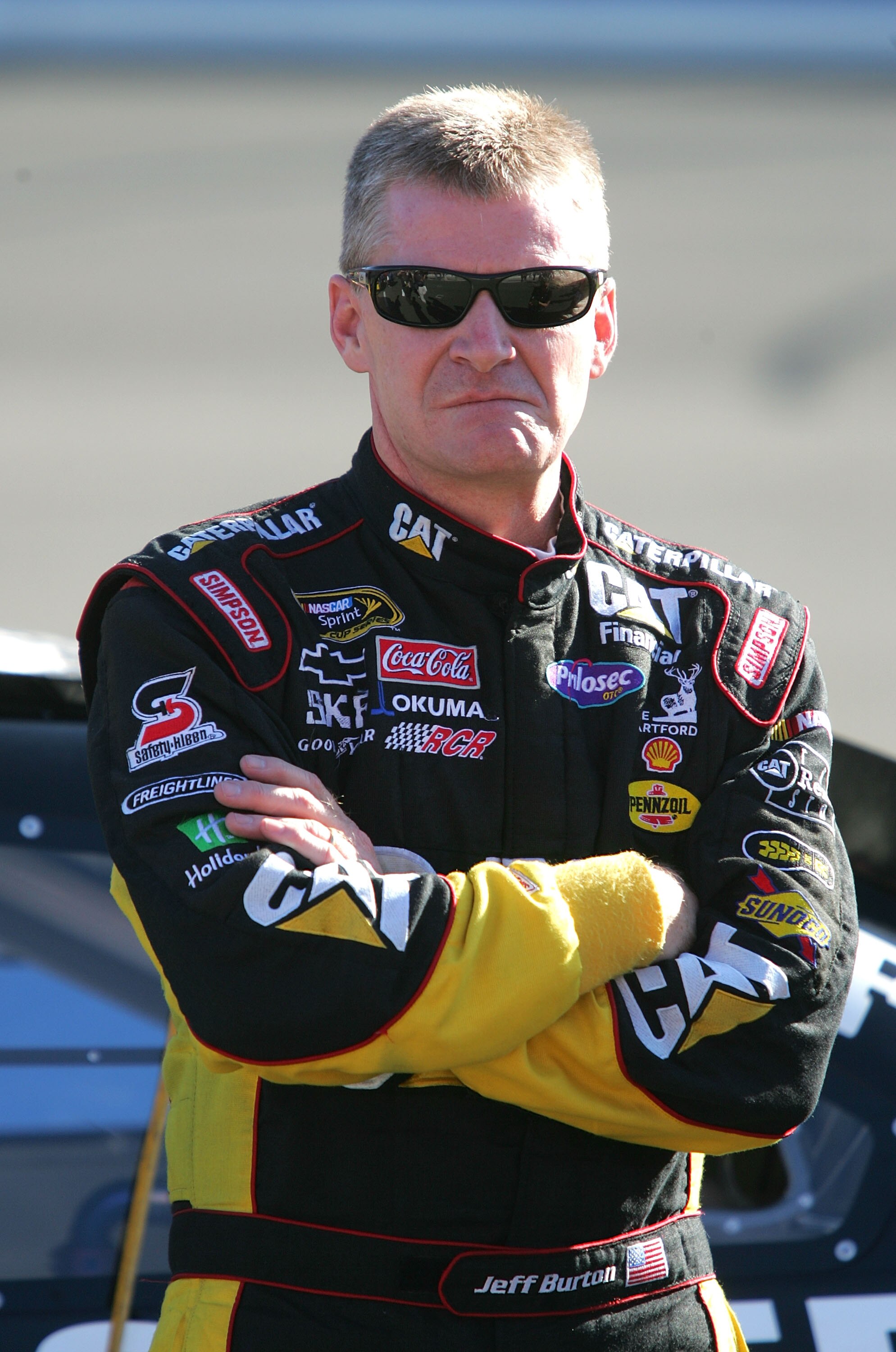 FONTANA, CA - OCTOBER 08:  Jeff Burton, driver of the #31 Caterpillar Chevrolet stands on pit road during qualifying for the NASCAR Sprint Cup Series Pepsi Max 400 on October 8, 2010 in Fontana, California.  (Photo by Jerry Markland/Getty Images for NASCA