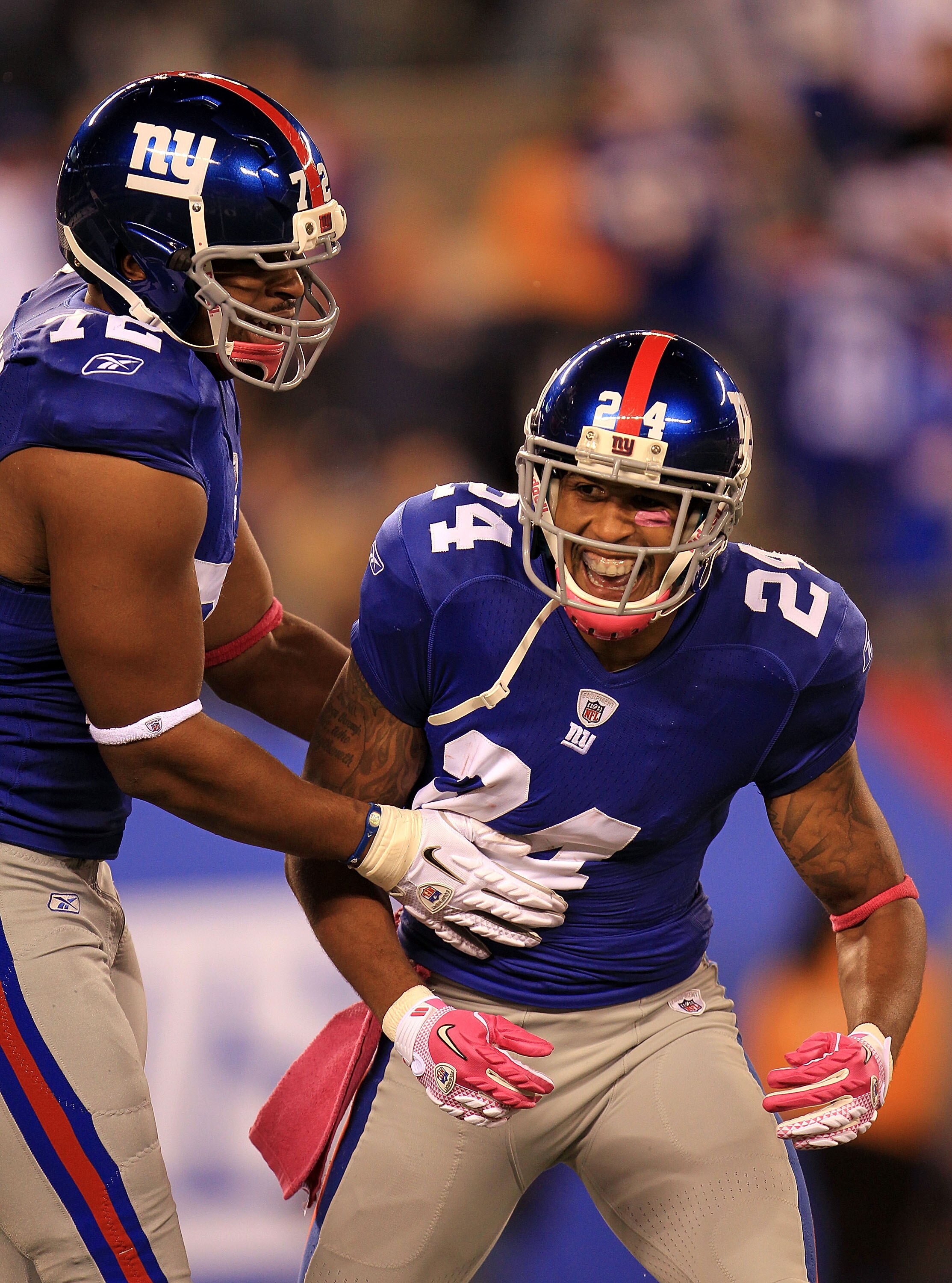 EAST RUTHERFORD, NJ - OCTOBER 03: Terrell Thomas #24 of the New York Giants celebrates after an interception against the Chicago Bears with teammate Osi Umenyiora #72 at New Meadowlands Stadium on October 3, 2010 in East Rutherford, New Jersey. (Photo b EAST RUTHERFORD, NJ - OCTOBER 03: Terrell Thomas #24 of the New York Giants celebrates after an interception against the Chicago Bears with teammate Osi Umenyiora #72 at New Meadowlands Stadium on October 3, 2010 in East Rutherford, New Jersey. (Photo b