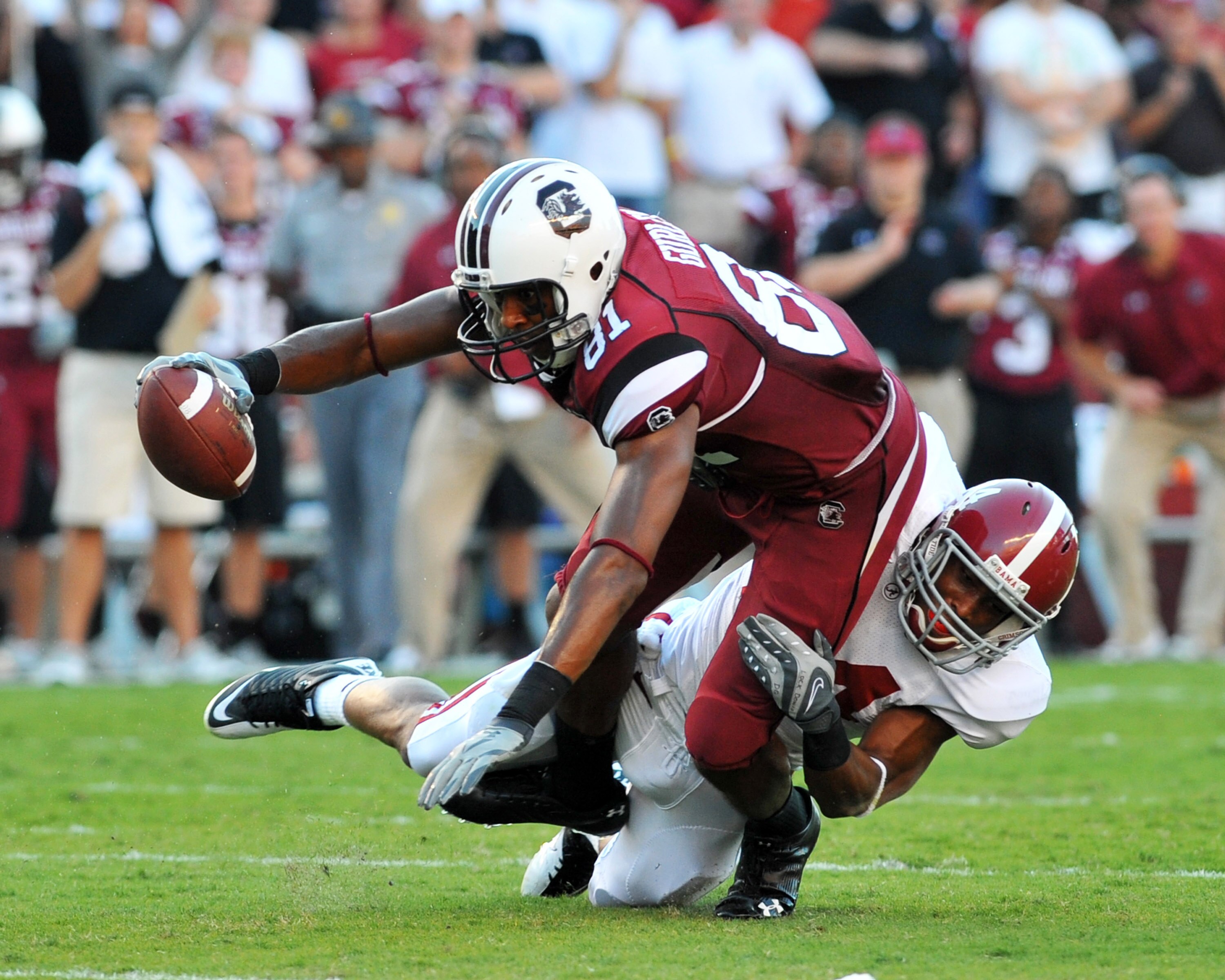 COLUMBIA, SC - OCTOBER 9: Wide receiver Tori Gurley #81 of the South Carolina Gamecocks stretches for a gain against the Alabama Crimson Tide October 9, 2010 at Williams-Brice Stadium in Columbia, South Carolina.  (Photo by Al Messerschmidt/Getty Images)