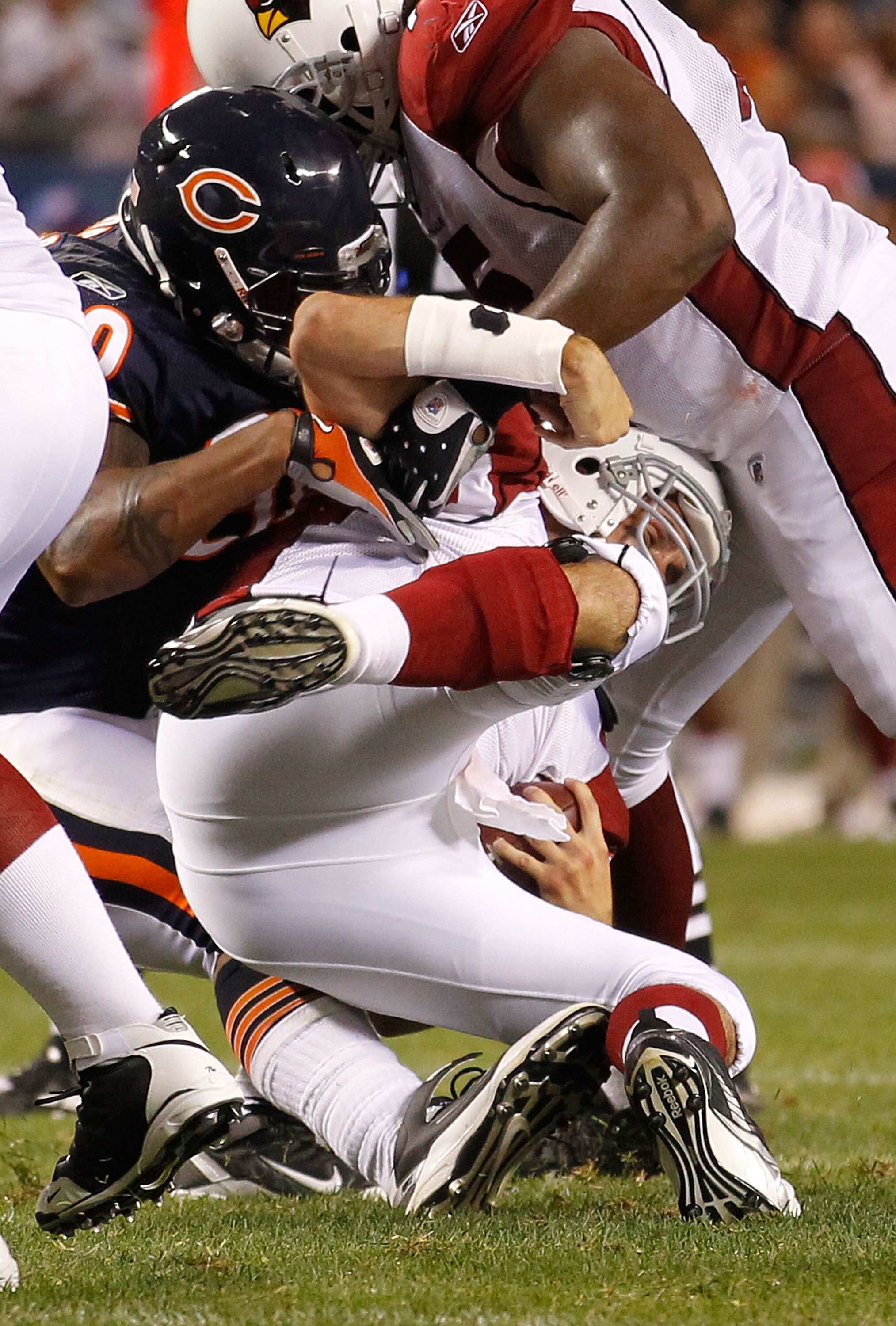 CHICAGO - AUGUST 28: Julius Peppers #90 of the Chicago Bears sacks Matt Leinart #7 of the Arizona Cardinals during a preseason game at Soldier Field on August 28, 2010 in Chicago, Illinois. The Cardinals defeated the Bears 14-9. (Photo by Jonathan Daniel/