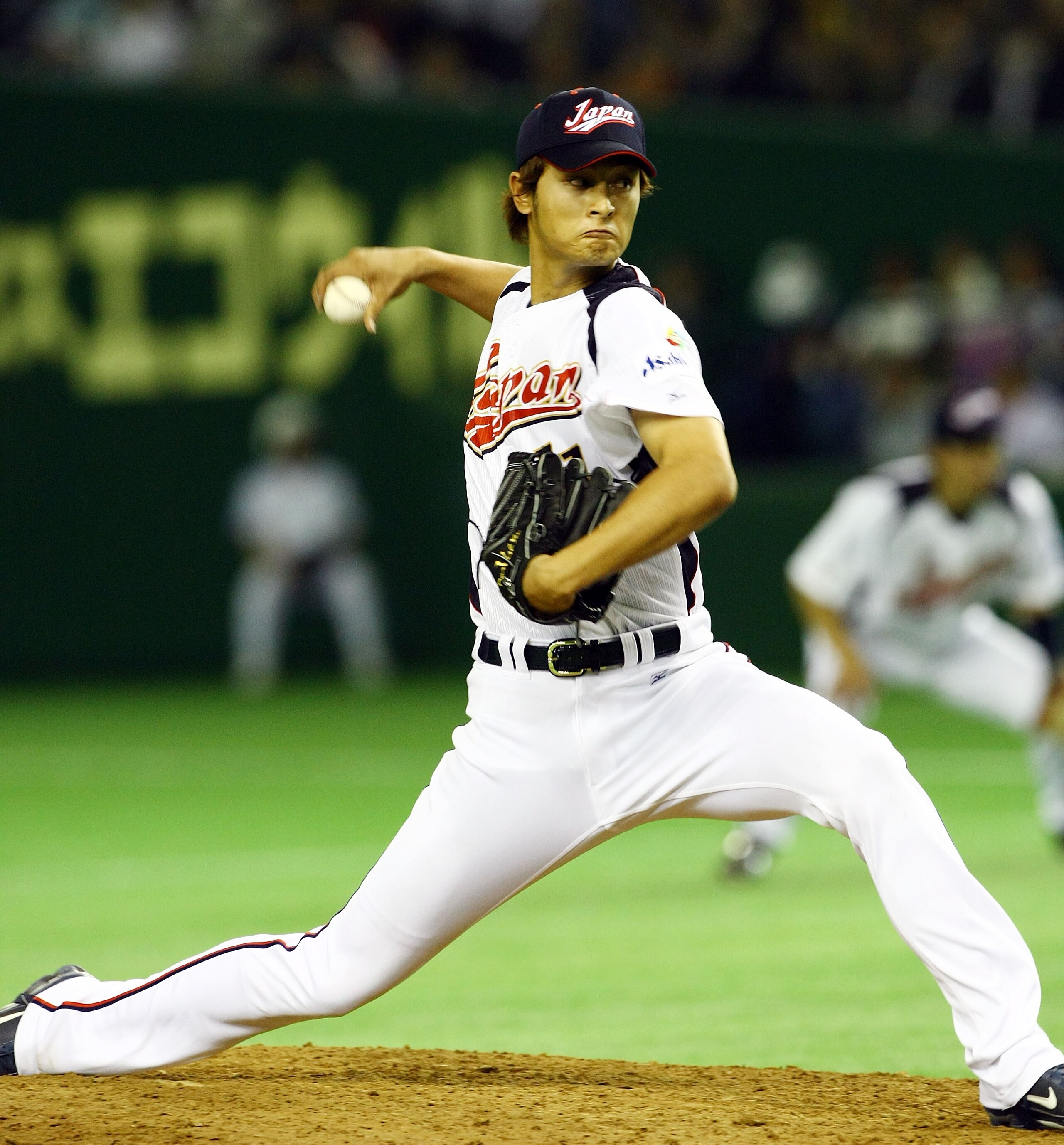 TOKYO - MARCH 09:  Pitcher Yu Darvish #11 of Japan throws a pitch during the World Baseball Classic Pool A Tokyo Round match between South Korea and Japan at Tokyo Dome on March 9, 2009 in Tokyo, Japan. (Photo by Junko Kimura/Getty Images)