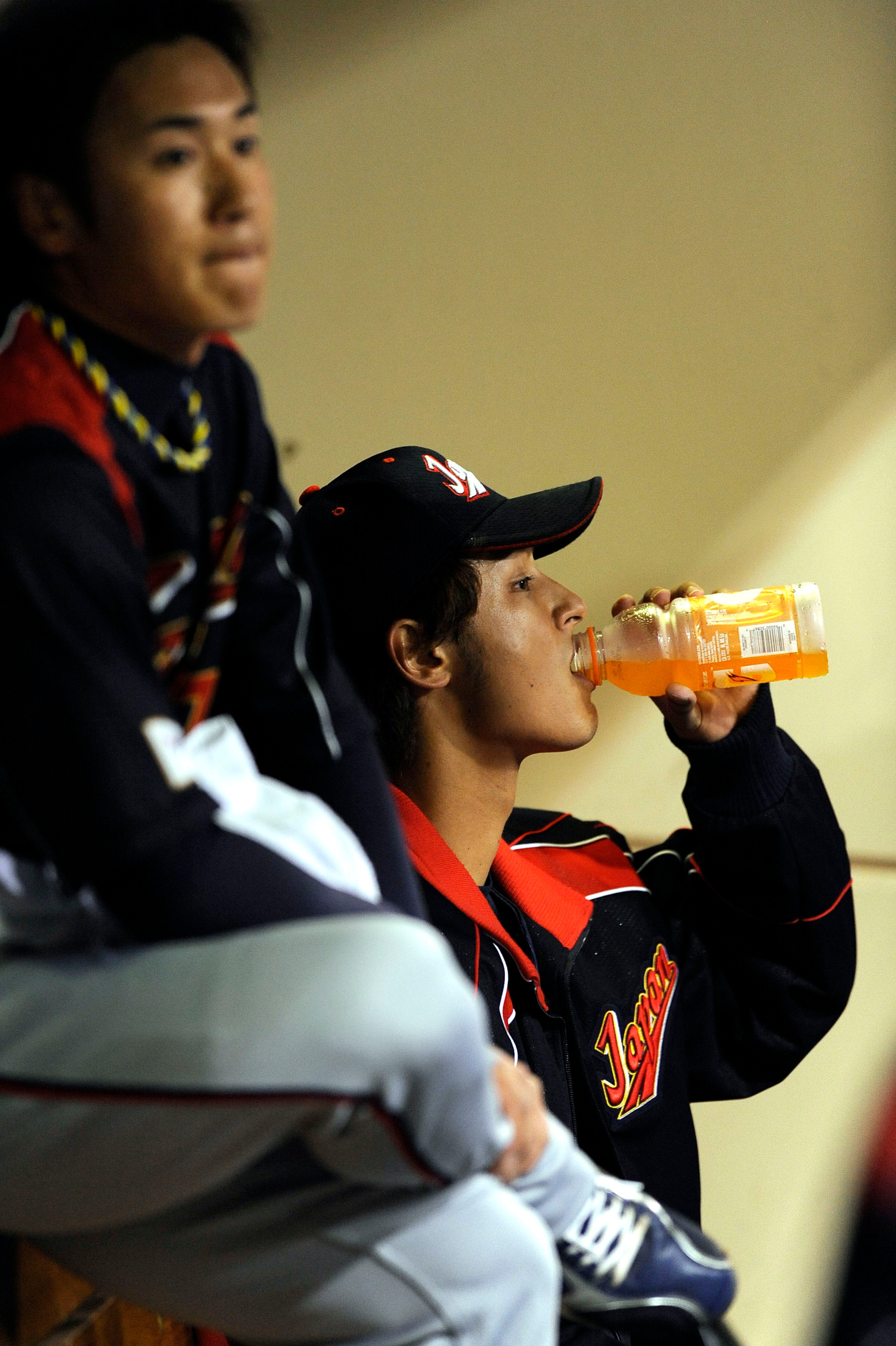 SAN DIEGO - MARCH 17:  Pitcher Yu Darvish #11 of Japan sits on the bench after giving up three runs in the first against Korea during the 2009 World Baseball Classic Round 2 Pool 1 Game 4 on March 17, 2009 at Petco Park in San Diego, California.  (Photo b