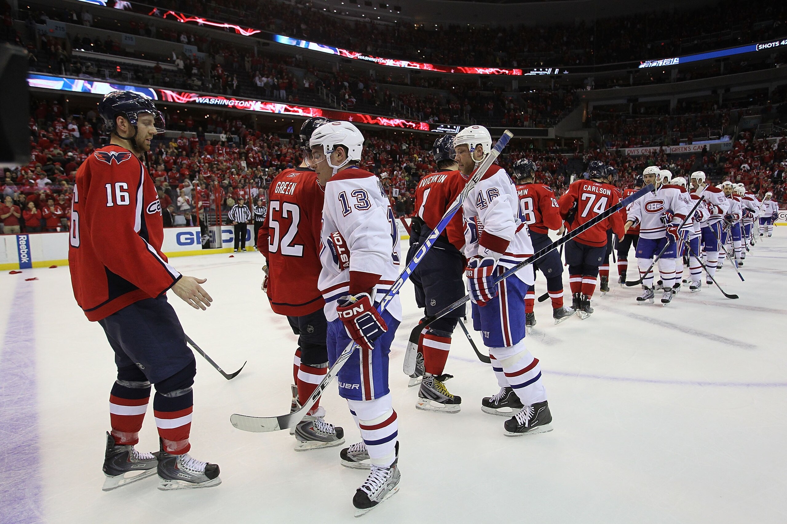 WASHINGTON - APRIL 28: The Montreal Canadiens and the Washington Capitals shake hands following Game Seven of the Eastern Conference Quarterfinals during the 2010 NHL Stanley Cup Playoffs at the Verizon Center on April 28, 2010 in Washington, DC. The Can WASHINGTON - APRIL 28: The Montreal Canadiens and the Washington Capitals shake hands following Game Seven of the Eastern Conference Quarterfinals during the 2010 NHL Stanley Cup Playoffs at the Verizon Center on April 28, 2010 in Washington, DC. The Can