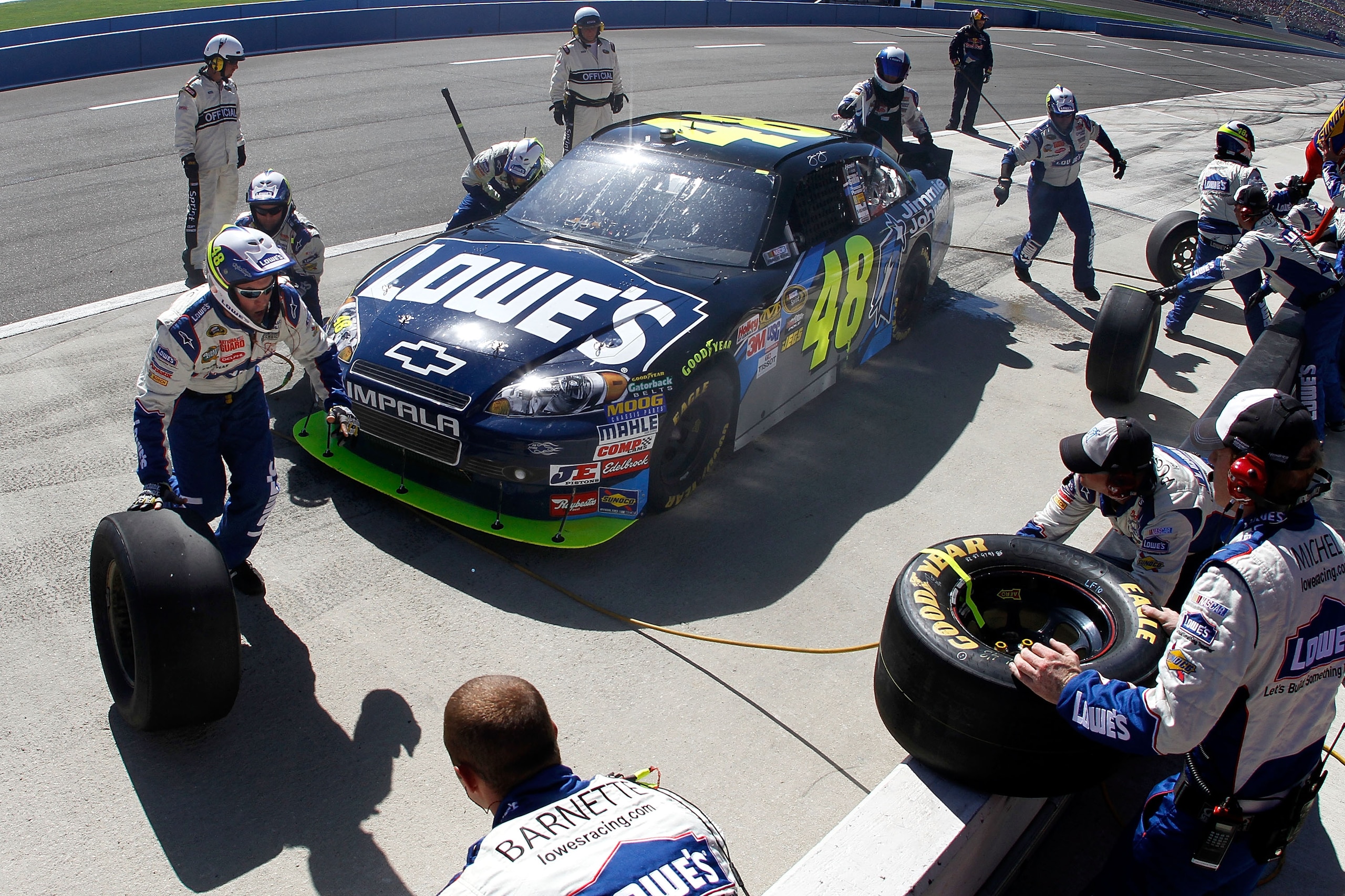 FONTANA, CA - OCTOBER 10: Jimmie Johnson, driver of the #48 Lowe's/Jimmie Johnson Foundation Chevrolet, makes a pit stop during the NASCAR Sprint Cup Series Pepsi Max 400 on October 10, 2010 in Fontana, California. (Photo by Jason Smith/Getty Images for FONTANA, CA - OCTOBER 10: Jimmie Johnson, driver of the #48 Lowe's/Jimmie Johnson Foundation Chevrolet, makes a pit stop during the NASCAR Sprint Cup Series Pepsi Max 400 on October 10, 2010 in Fontana, California. (Photo by Jason Smith/Getty Images for