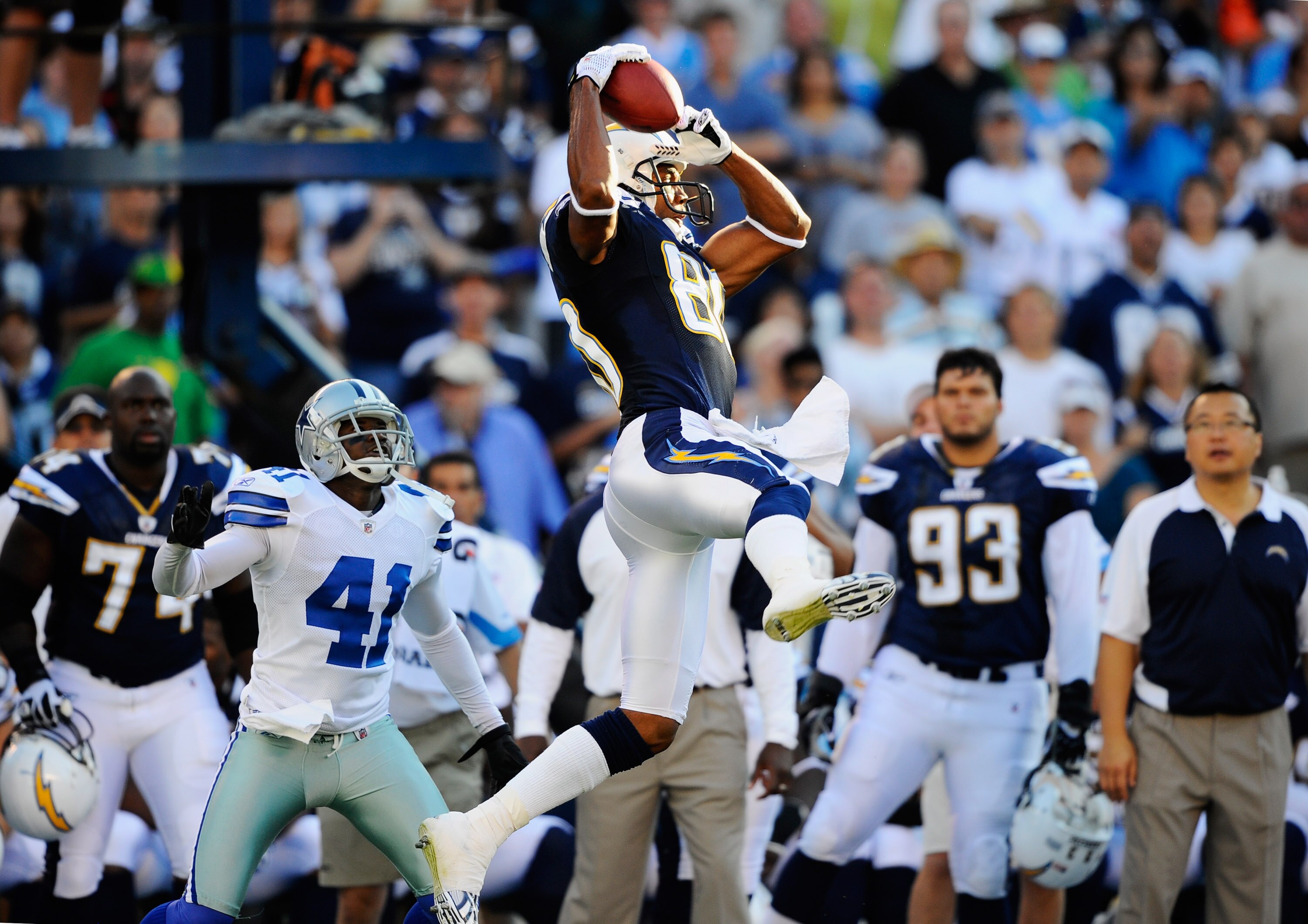SAN DIEGO - AUGUST 21:  Wide receiver Malcolm Floyd #80 catches a pass against Terence Newman #41 of the Dallas Cowboys during their preseason NFL football game at Qualcomm Stadium on August 21, 2010 in San Diego, California.  (Photo by Kevork Djansezian/