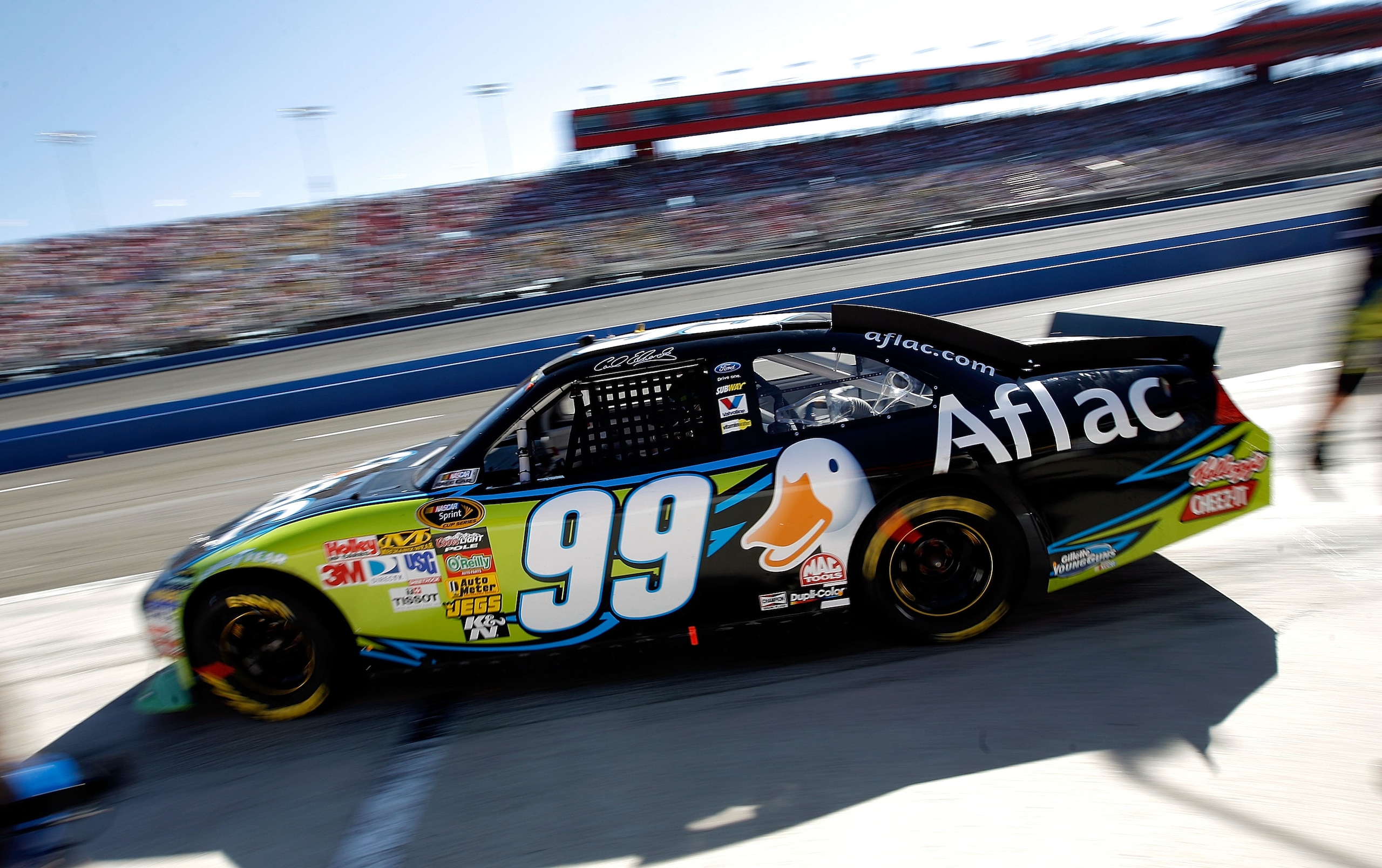 FONTANA, CA - OCTOBER 10: Carl Edwards, driver of the #99 Aflac Ford, leaves the pits after making a stop during the NASCAR Sprint Cup Series Pepsi Max 400 on October 10, 2010 in Fontana, California. (Photo by Tom Pennington/Getty Images for NASCAR) FONTANA, CA - OCTOBER 10: Carl Edwards, driver of the #99 Aflac Ford, leaves the pits after making a stop during the NASCAR Sprint Cup Series Pepsi Max 400 on October 10, 2010 in Fontana, California. (Photo by Tom Pennington/Getty Images for NASCAR)