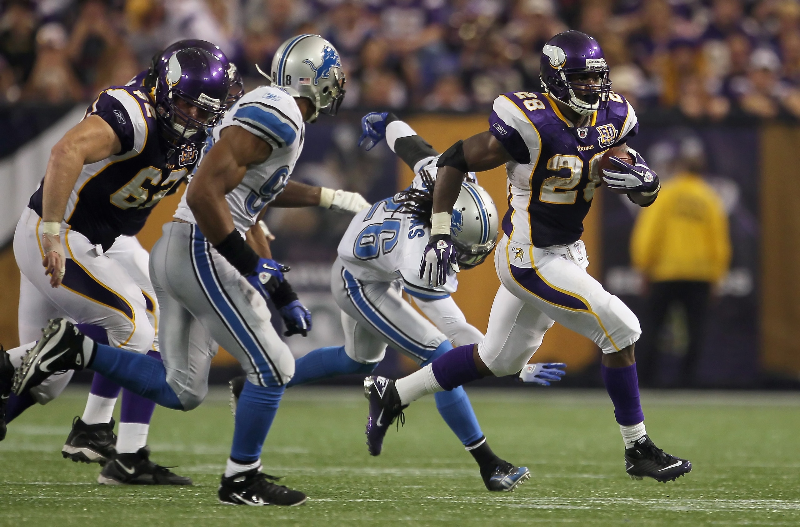MINNEAPOLIS - SEPTEMBER 26:  Running back Adrian Peterson #28 of the Minnesota Vikings carries the ball against the Detroit Lions at Mall of America Field on September 26, 2010 in Minneapolis, Minnesota. The Vikings defeated the Lions 24-10.  (Photo by Je
