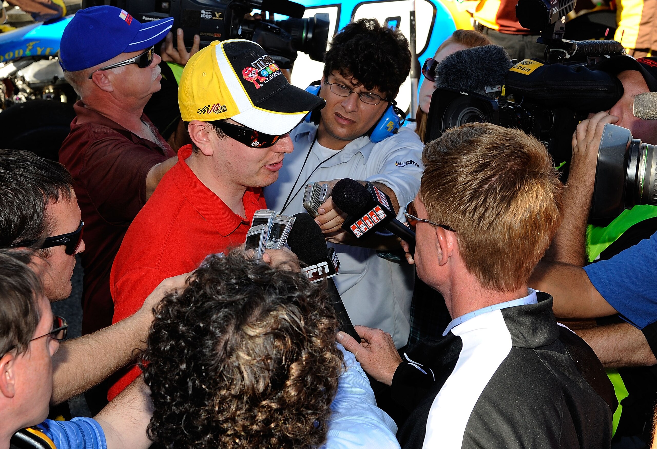 FONTANA, CA - OCTOBER 10: Kyle Busch, driver of the #18 M&M'sToyota, speaks to the media after blowing a motor during the NASCAR Sprint Cup Series Pepsi Max 400 on October 10, 2010 in Fontana, California. (Photo by Rusty Jarrett/Getty Images for NASCAR) FONTANA, CA - OCTOBER 10: Kyle Busch, driver of the #18 M&M'sToyota, speaks to the media after blowing a motor during the NASCAR Sprint Cup Series Pepsi Max 400 on October 10, 2010 in Fontana, California. (Photo by Rusty Jarrett/Getty Images for NASCAR)