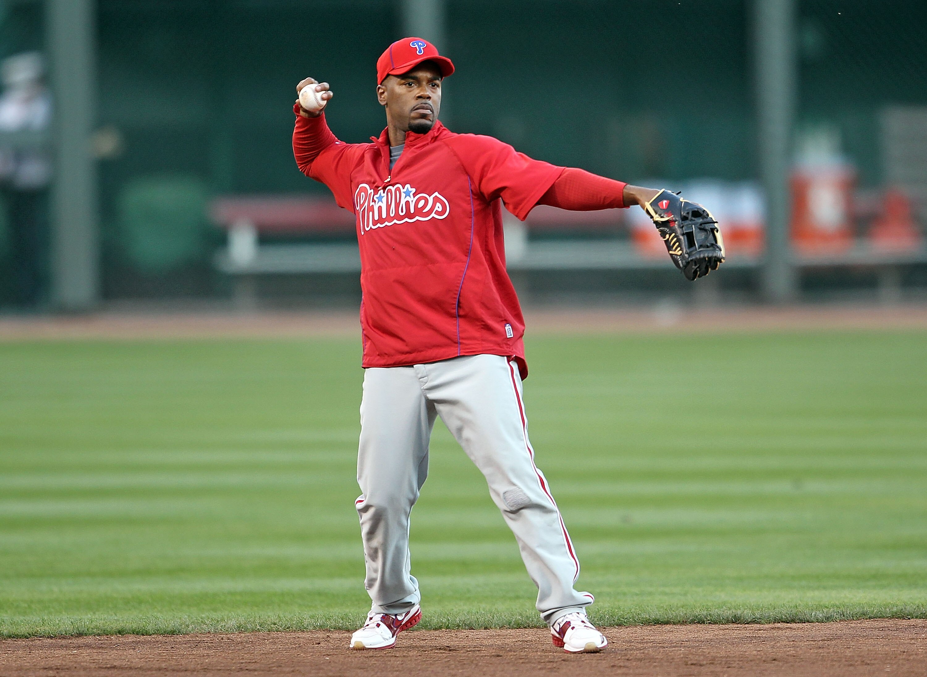 CINCINNATI - OCTOBER 10: Jimmy Rollins #11 of the Philadelphia Phillies participates in batting practice before the start of  Game 3 of the NLDS against the Cincinnati Reds at Great American Ball Park on October 10, 2010 in Cincinnati, Ohio.  (Photo by An