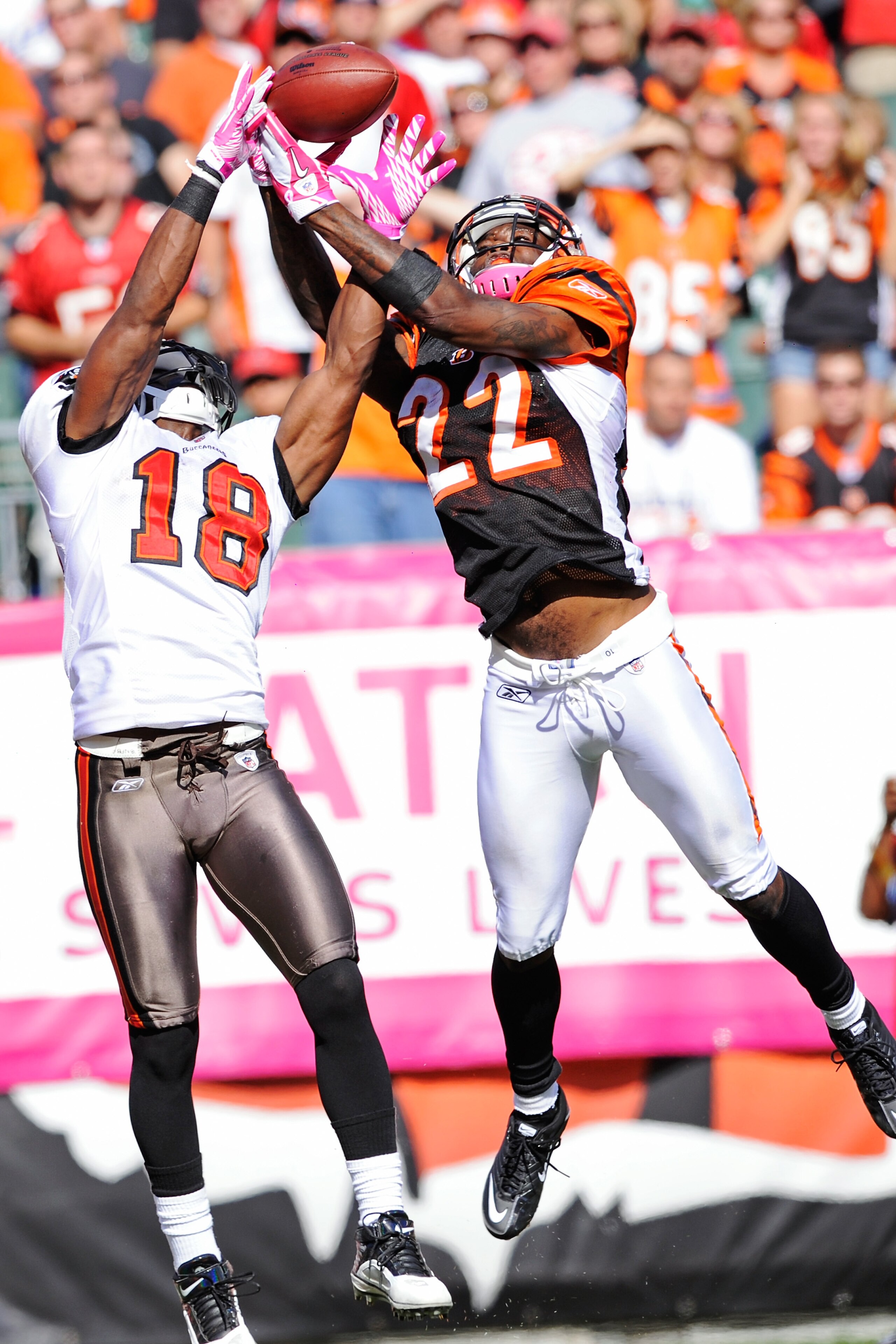 CINCINNATI, OH - OCTOBER 10:  Johnathan Joseph #22 of the Cincinnati Bengals breaks up a pass intended for Sammie Stroughter #18 of the Tampa Bay Buccaneers at Paul Brown Stadium on October 10, 2010 in Cincinnati, Ohio.  (Photo by Jamie Sabau/Getty Images