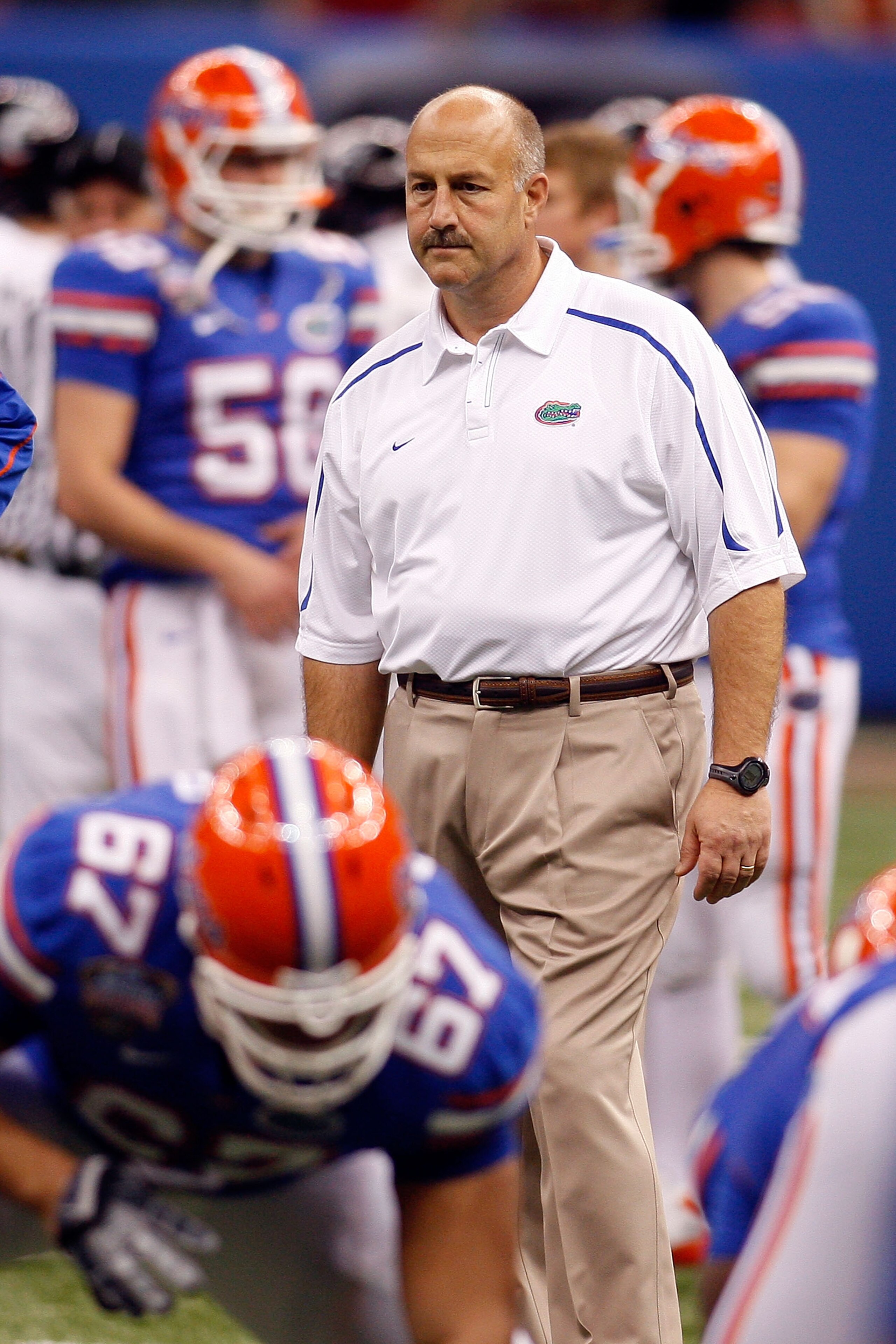 NEW ORLEANS - JANUARY 01:  Offensive coordinator and interim head coach Steve Addazio (C) of the Florida Gators stands on the field before the Allstate Sugar Bowl against the Cincinnati Bearcats at the Louisana Superdome on January 1, 2010 in New Orleans,