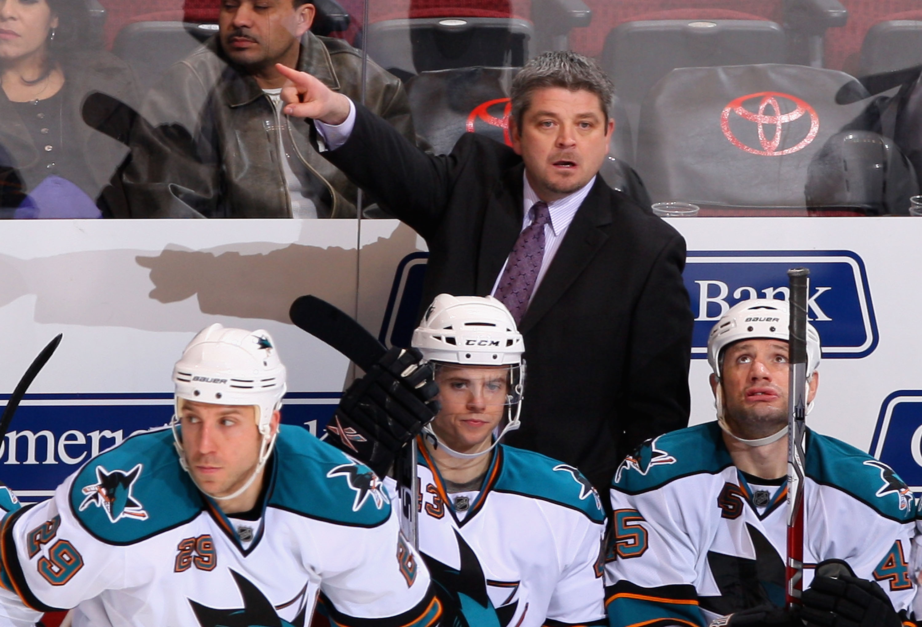 GLENDALE, AZ - JANUARY 12:  Head coach Todd McLellan of the San Jose Sharks directs his team during the NHL game against the Phoenix Coyotes at Jobing.com Arena on January 12, 2010 in Glendale, Arizona. The Sharks defeated the Coyotes 3-1. (Photo by Chris