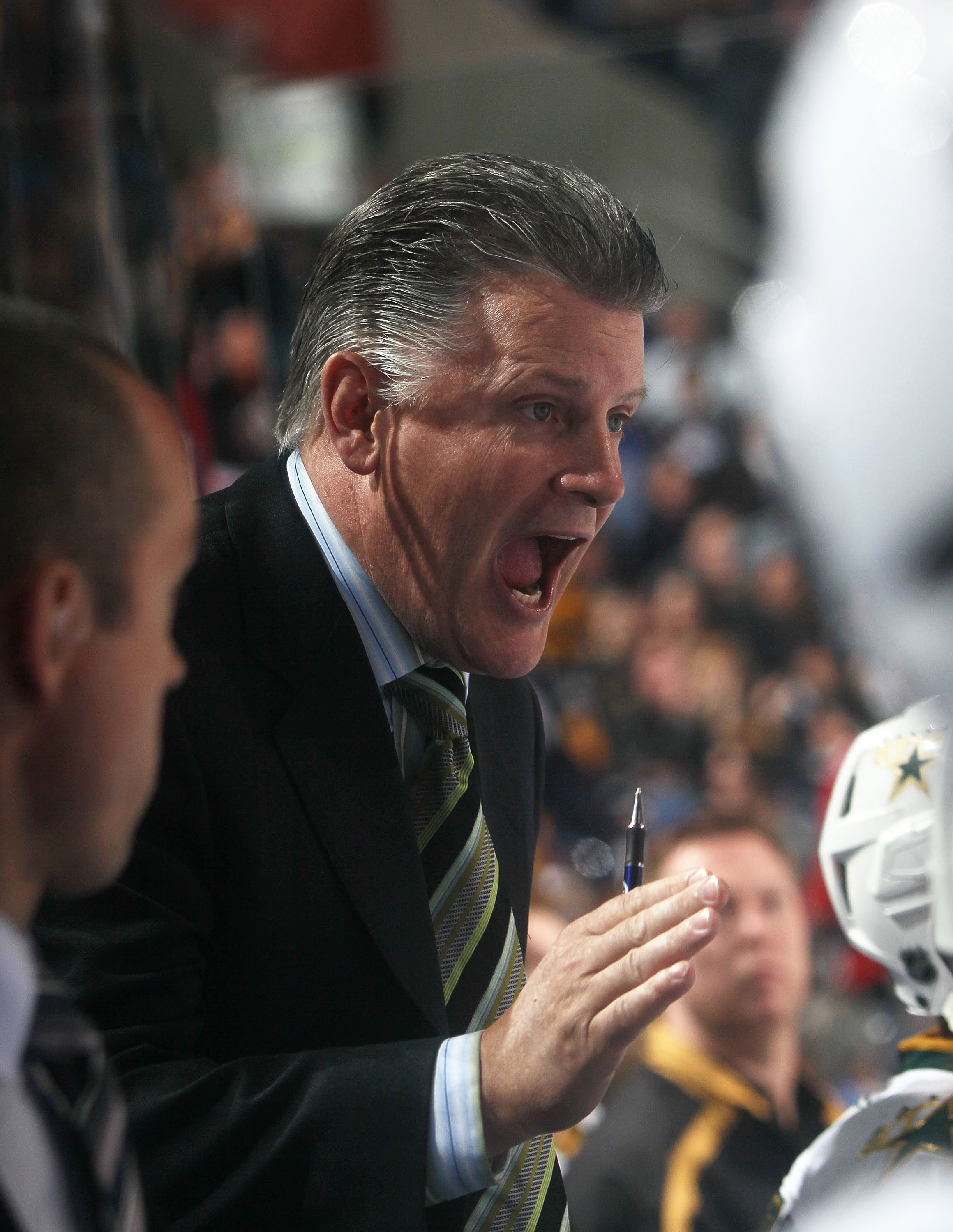 BUFFALO, NY - MARCH 10: Head coach Marc Crawford of the Dallas Stars gives last-minute instructions to his team during the game against the Buffalo Sabres at the HSBC Arena on March 10, 2010 in Buffalo, New York. The Sabres defeated the Stars 5-3. (Photo