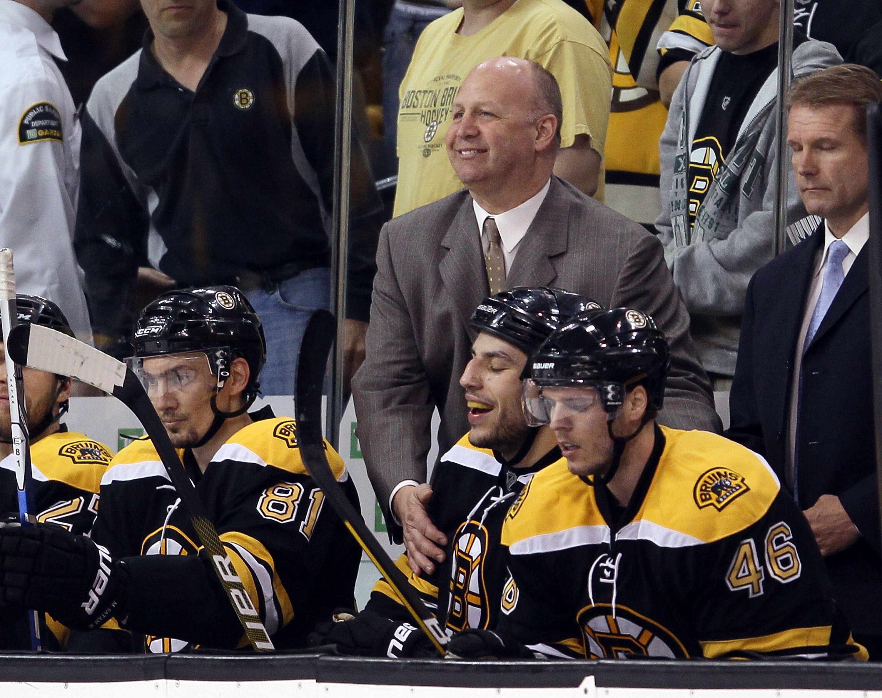 BOSTON - MAY 03:  Head coach Claude Julien of the Boston Bruins congratulates Milan Lucic #17 after he scored the game winner in the third period against the Philadelphia Flyers in Game Two of the Eastern Conference Semifinals during the 2010 NHL Stanley