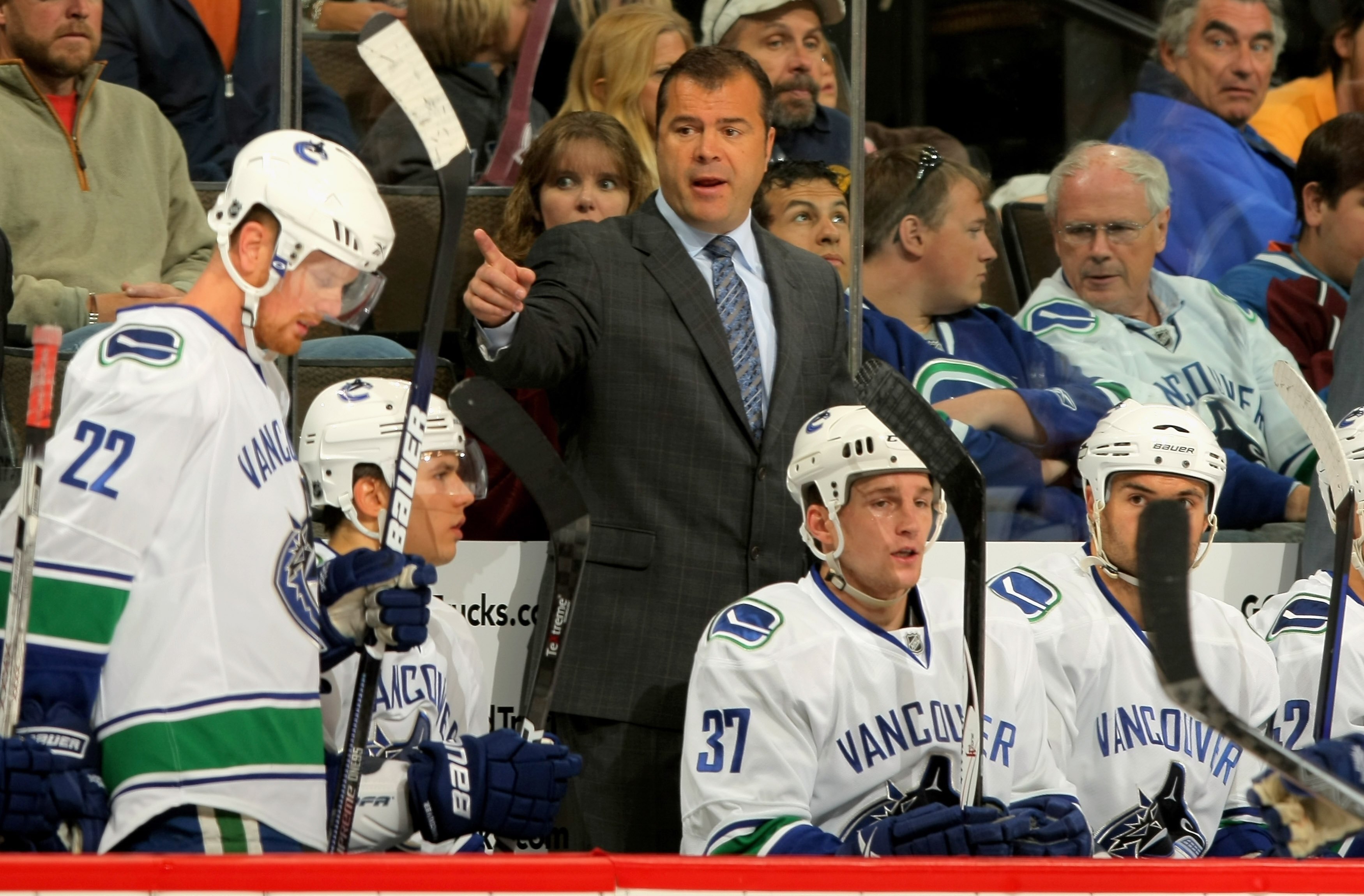 DENVER - OCTOBER 03:  Head coach Alain Vigneault of the Vancouver Canucks leads his team against  the Colorado Avalanche during NHL action at the Pepsi Center on October 3, 2009 in Denver, Colorado.  (Photo by Doug Pensinger/Getty Images)
