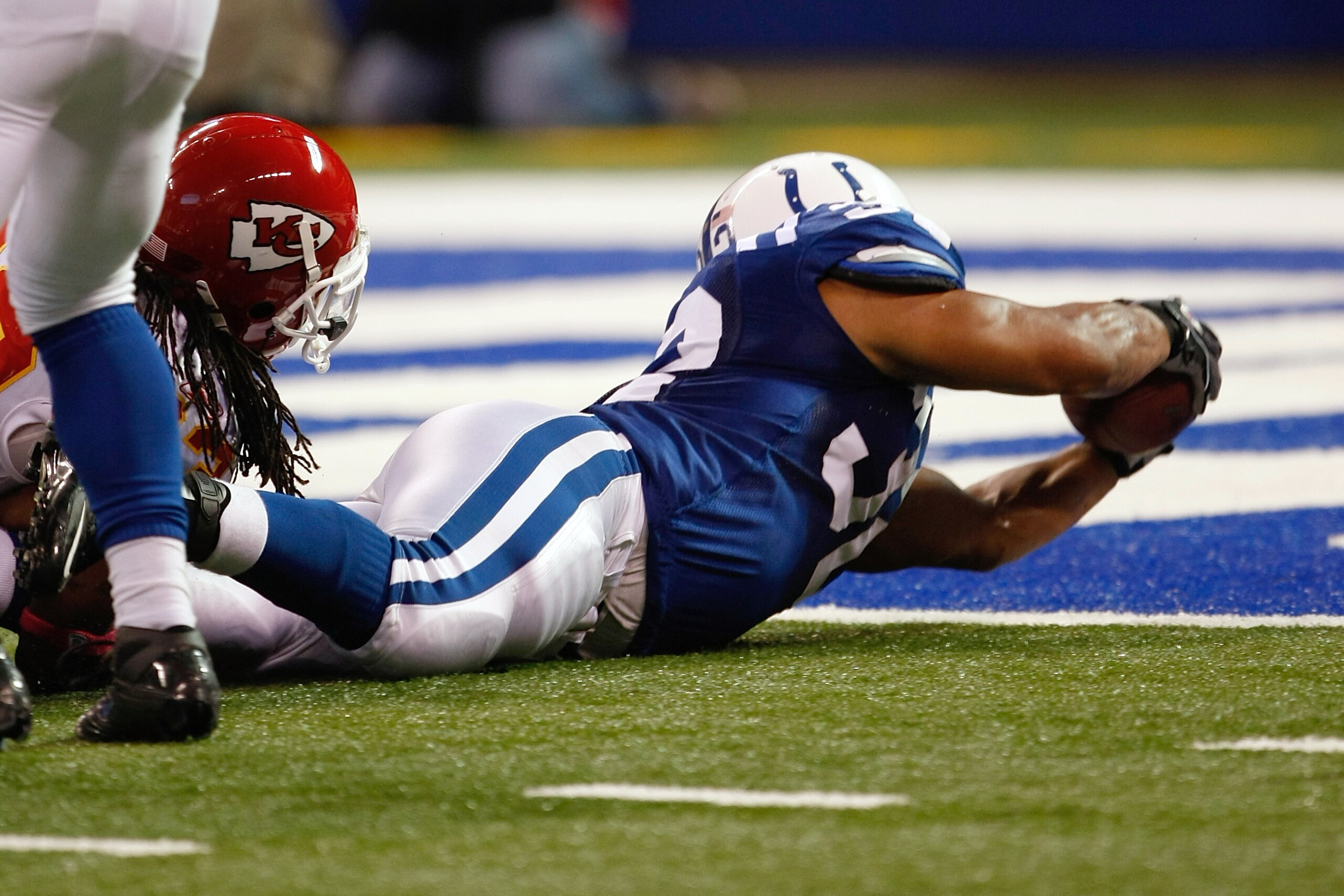 INDIANAPOLIS, IN - OCTOBER 10: Mike Hart #32 of the Indianapolis Colts dives for a touchdown against the Kansas City Chiefs at Lucas Oil Stadium on October 10, 2010 in Indianapolis, Indiana. The Colts defeated the Chiefs 19-9. (Photo by Scott Boehm/Getty