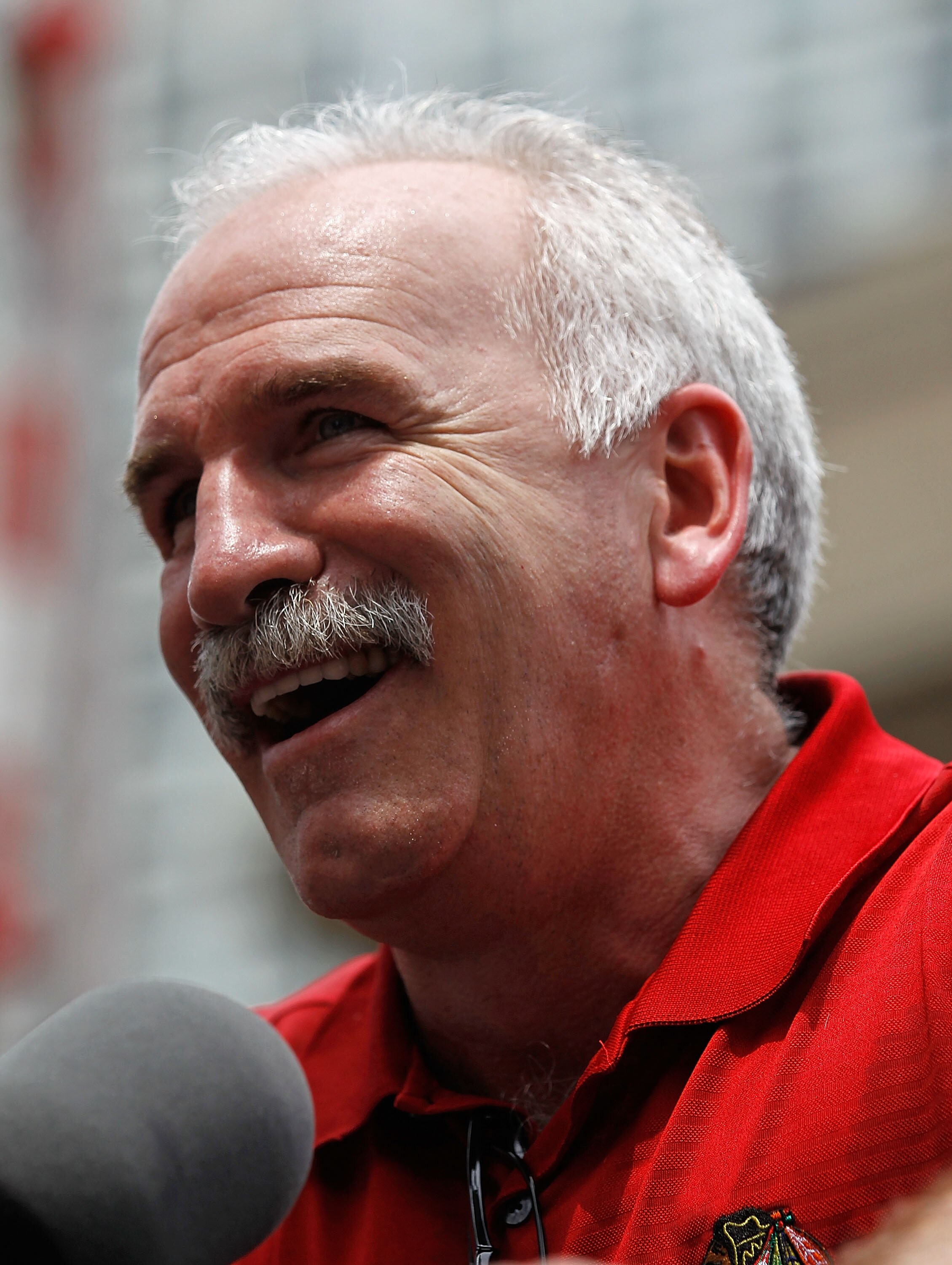 CHICAGO - JUNE 11: Head coach Joel Quenneville speaks to the crowd during the Chicago Blackhawks Stanley Cup victory parade and rally on June 11, 2010 in Chicago, Illinois. (Photo by Jonathan Daniel/Getty Images)