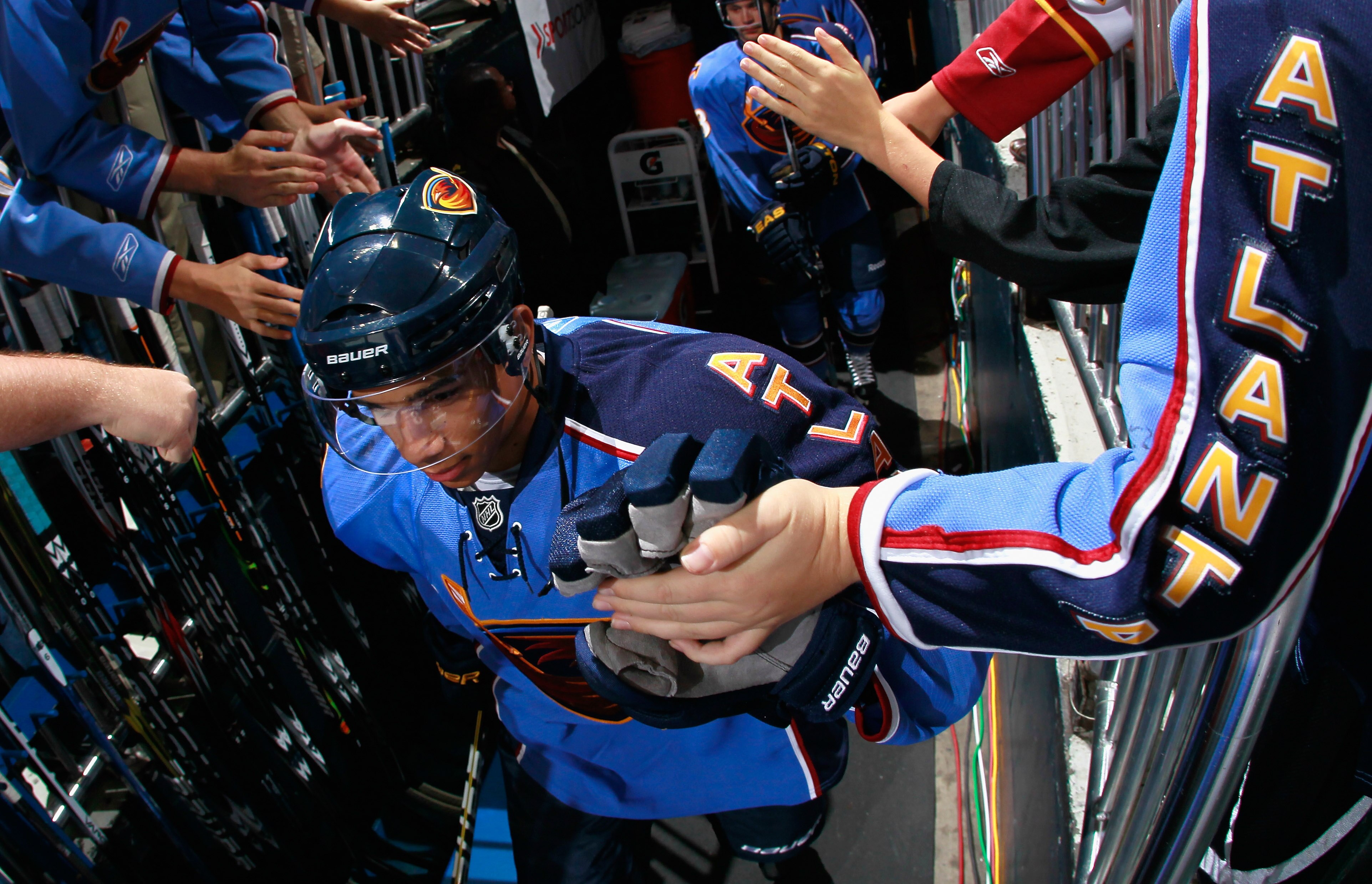 ATLANTA - OCTOBER 08:  Evander Kane #9 of the Atlanta Thrashers walks out of the locker room for pregame warmups before facing the Washington Capitals at Philips Arena on October 8, 2010 in Atlanta, Georgia.  (Photo by Kevin C. Cox/Getty Images)