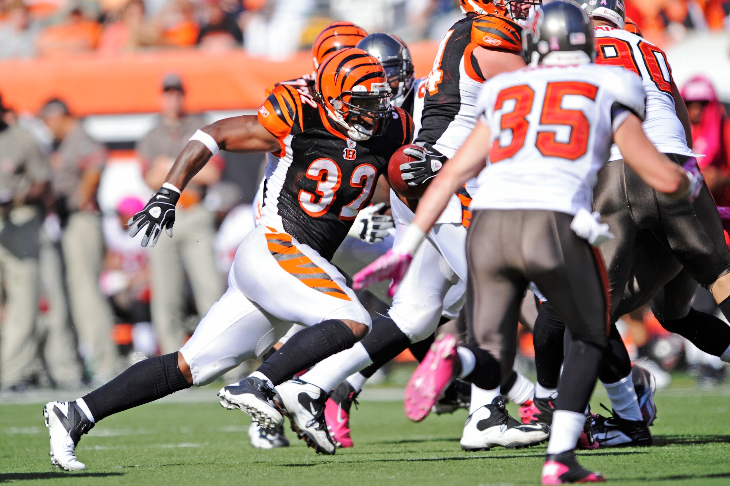 CINCINNATI, OH - OCTOBER 10:  Halfback Cedric Benson #32 of the Cincinnati Bengals picks up yardage against the Tampa Bay Buccaneers at Paul Brown Stadium on October 10, 2010 in Cincinnati, Ohio.  (Photo by Jamie Sabau/Getty Images)