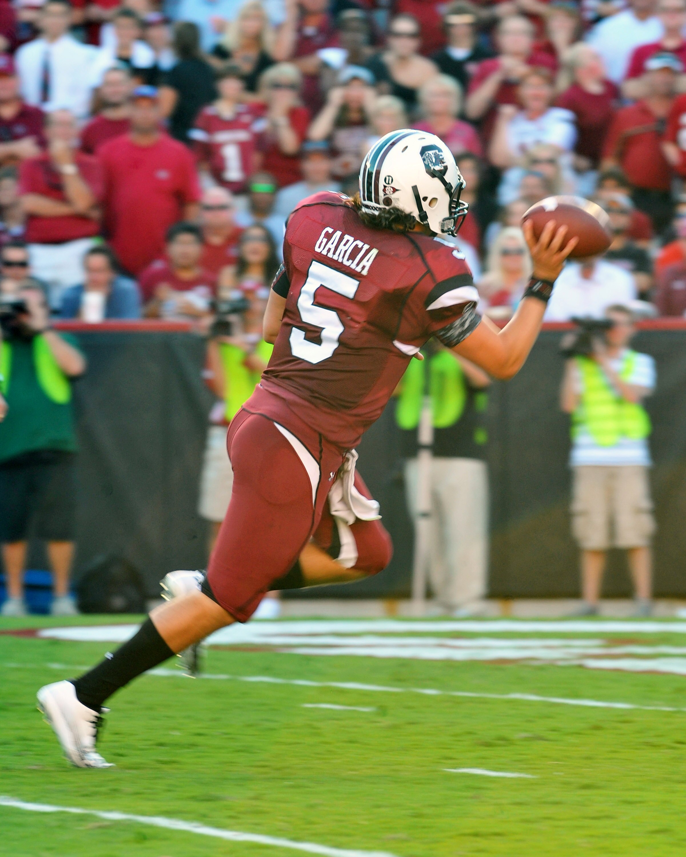 COLUMBIA, SC - OCTOBER 9: Quarterback Stephen Garcia #5 of the South Carolina Gamecocks tosses the football out of the end zone to avoid a sack after a botched snap against the Alabama Crimson Tide October 9, 2010 at Williams-Brice Stadium in Columbia, So