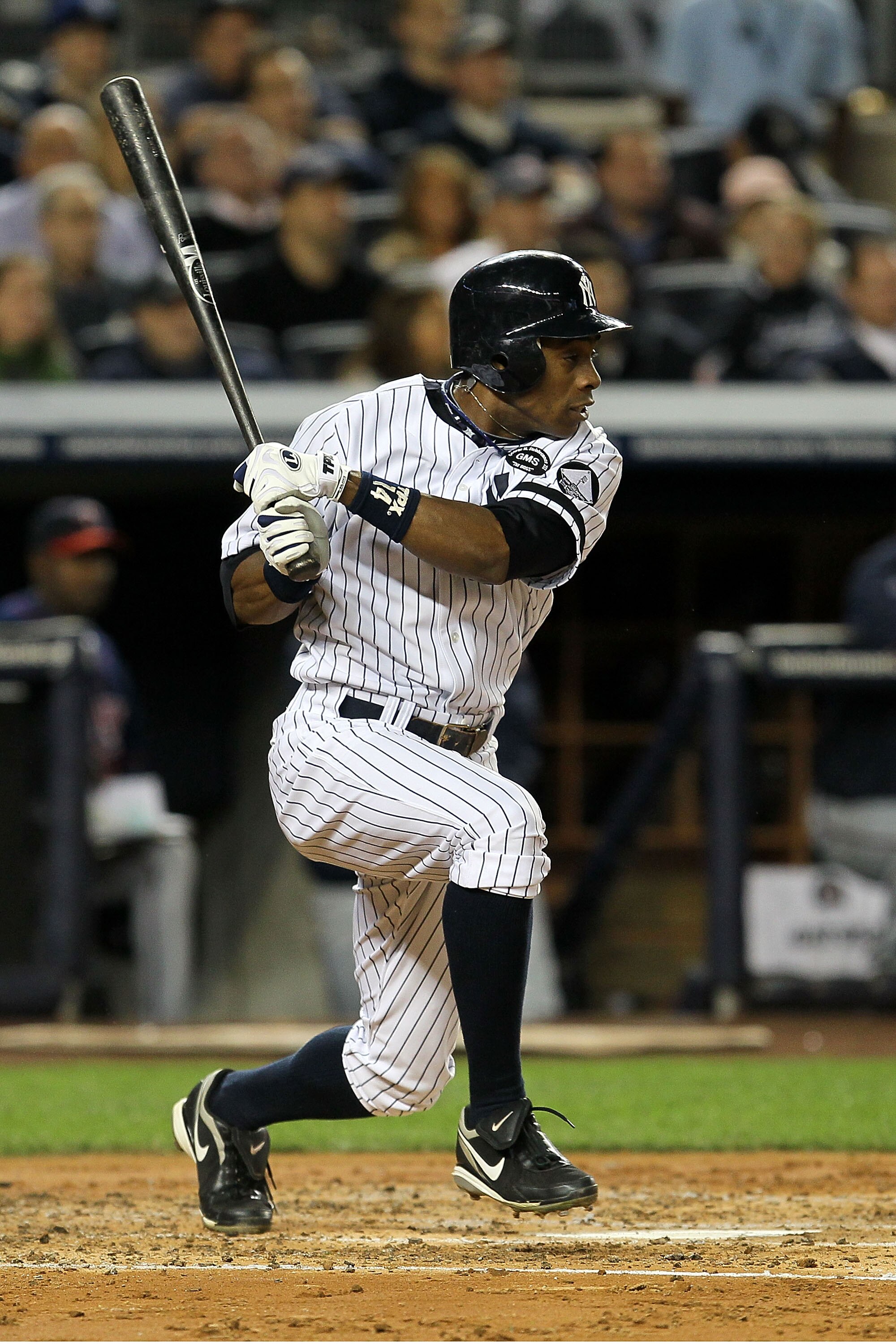 NEW YORK - OCTOBER 09:  Curtis Granderson #14 of the New York Yankees grounds into a double play in the second inning against the Minnesota Twins during Game Three of the ALDS part of the 2010 MLB Playoffs at Yankee Stadium on October 9, 2010 in the Bronx