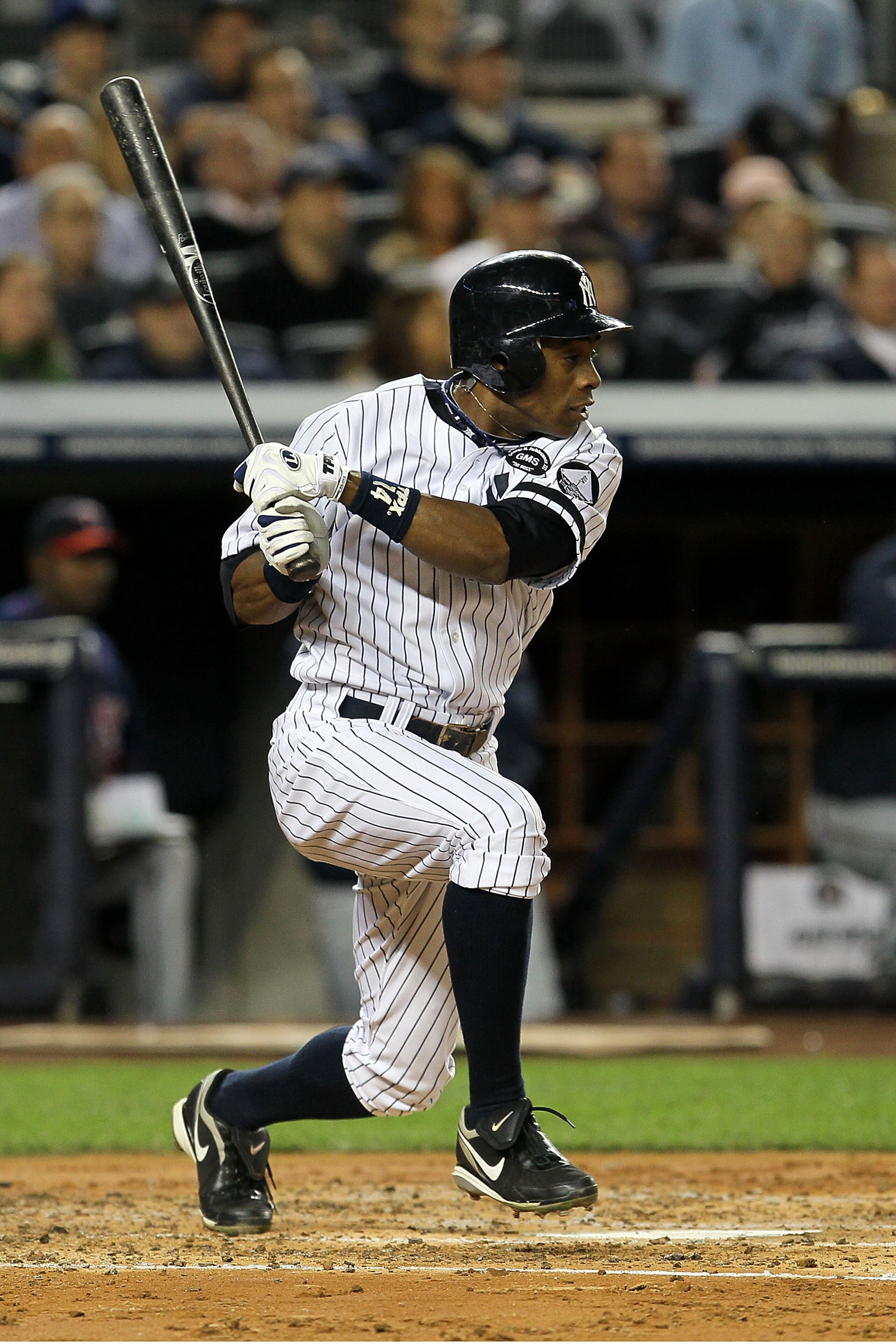 NEW YORK - OCTOBER 09:  Curtis Granderson #14 of the New York Yankees grounds into a double play in the second inning against the Minnesota Twins during Game Three of the ALDS part of the 2010 MLB Playoffs at Yankee Stadium on October 9, 2010 in the Bronx