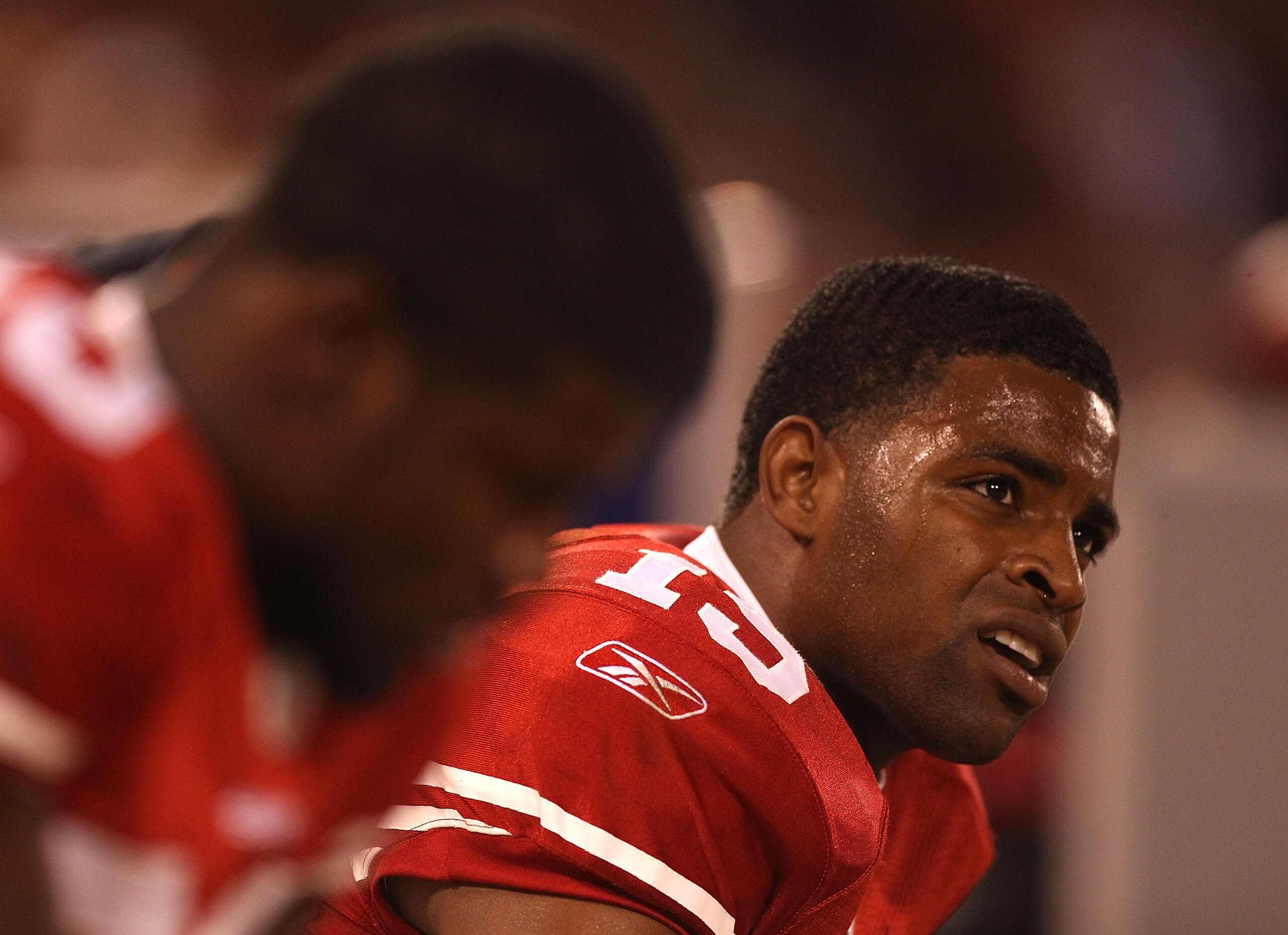 SAN FRANCISCO - OCTOBER 10:  Michael Crabtree #15 of the San Francisco 49ers looks on against the Philadelphia Eagles during an NFL game at Candlestick Park on October 10, 2010 in San Francisco, California.(Photo by Jed Jacobsohn/Getty Images)