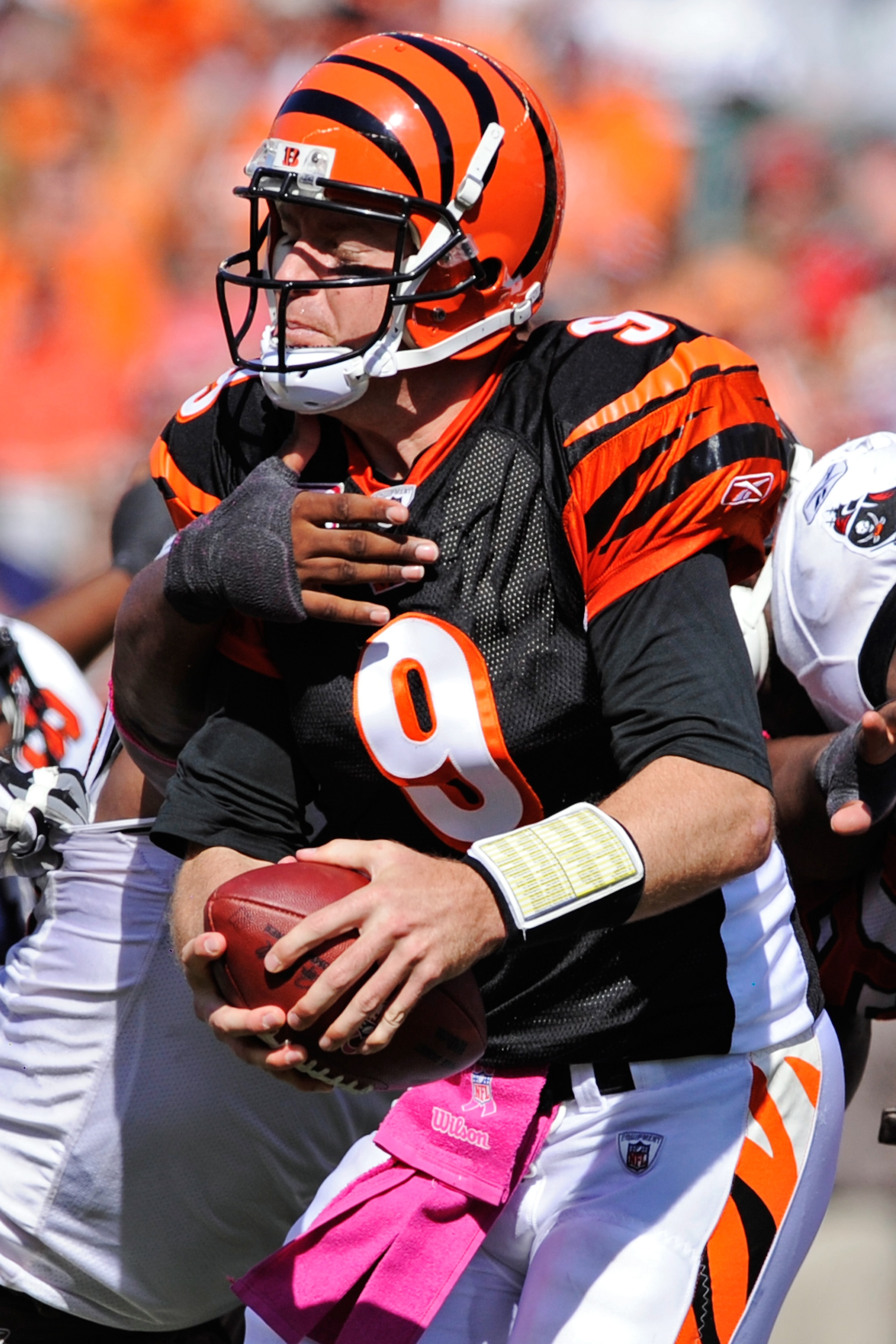 CINCINNATI, OH - OCTOBER 10:  Quarterback Carson Palmer #9 of the Cincinnati Bengals is pressured by the Tampa Bay Buccaneers defense at Paul Brown Stadium on October 10, 2010 in Cincinnati, Ohio.  (Photo by Jamie Sabau/Getty Images)