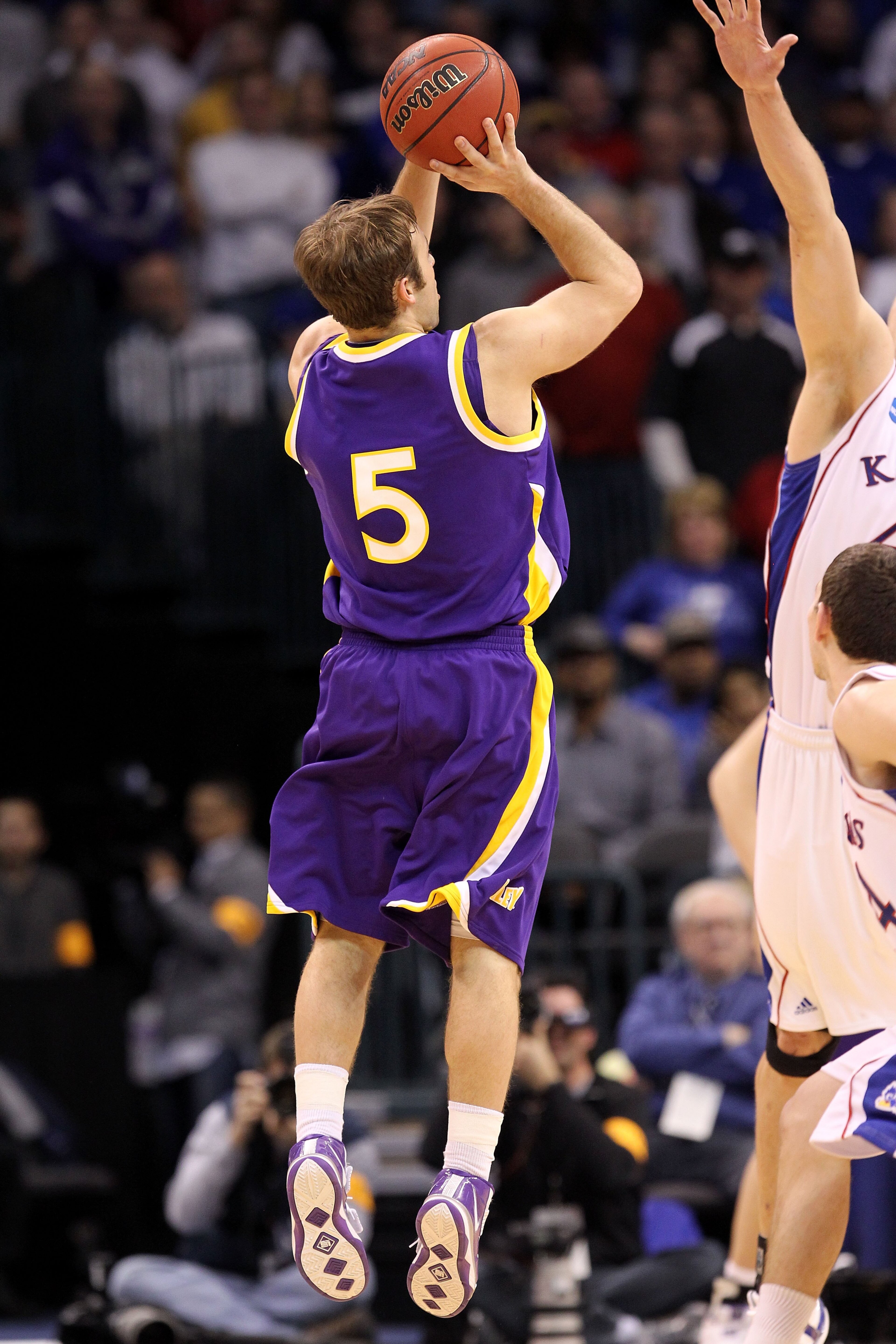 OKLAHOMA CITY - MARCH 20: Ali Farokhmanesh #5 the Northern Iowa Panthers attempts a shot against the Kansas Jayhawks during the second round of the 2010 NCAA men's basketball tournament at Ford Center on March 20, 2010 in Oklahoma City, Oklahoma. (Photo OKLAHOMA CITY - MARCH 20: Ali Farokhmanesh #5 the Northern Iowa Panthers attempts a shot against the Kansas Jayhawks during the second round of the 2010 NCAA men's basketball tournament at Ford Center on March 20, 2010 in Oklahoma City, Oklahoma. (Photo