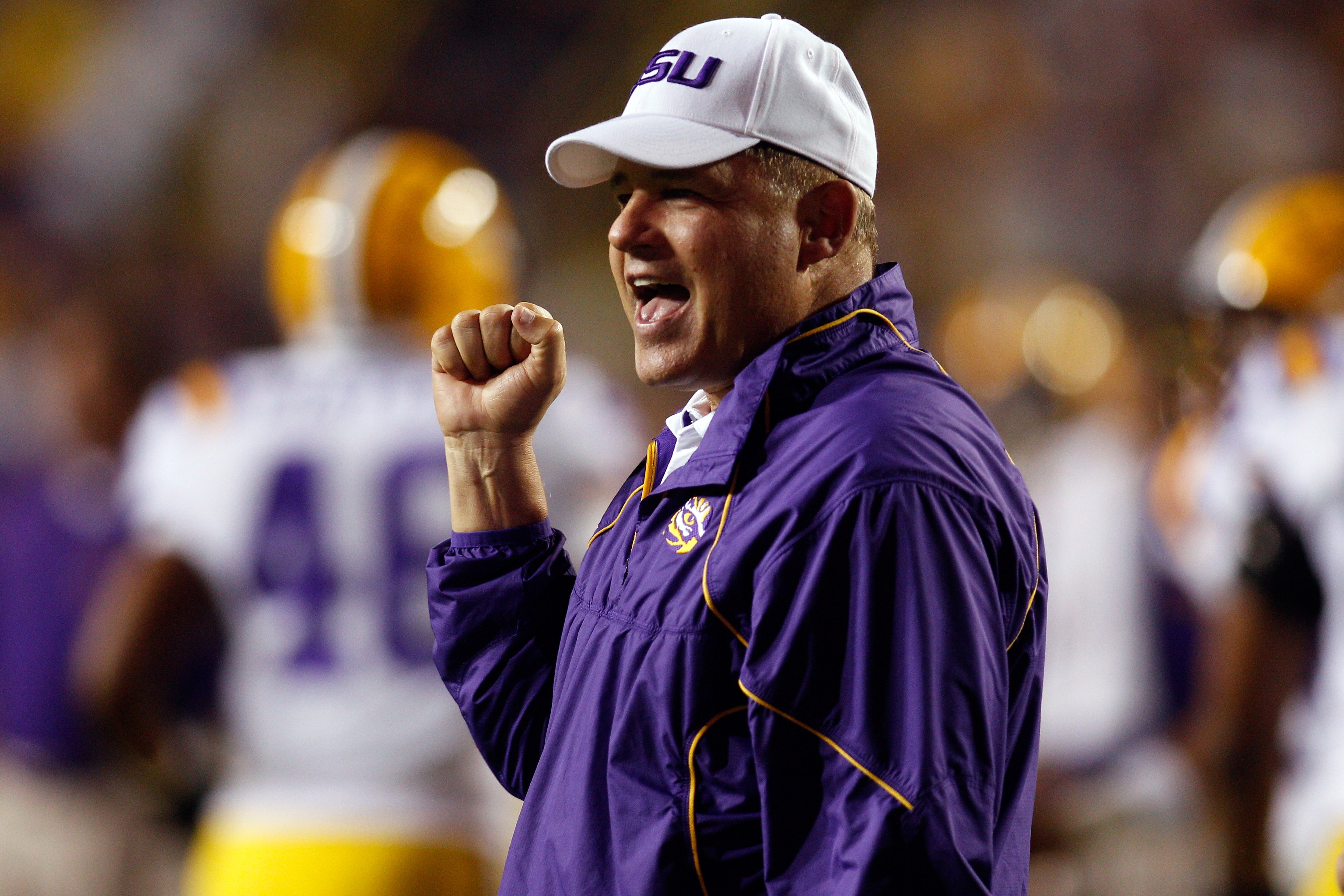 BATON ROUGE, LA - SEPTEMBER 25:  Head coach Les Miles of the Louisiana State University Tigers cheers during pregame before playing the West Virginia Mountaineers at Tiger Stadium on September 25, 2010 in Baton Rouge, Louisiana.  The Tigers defeated the M