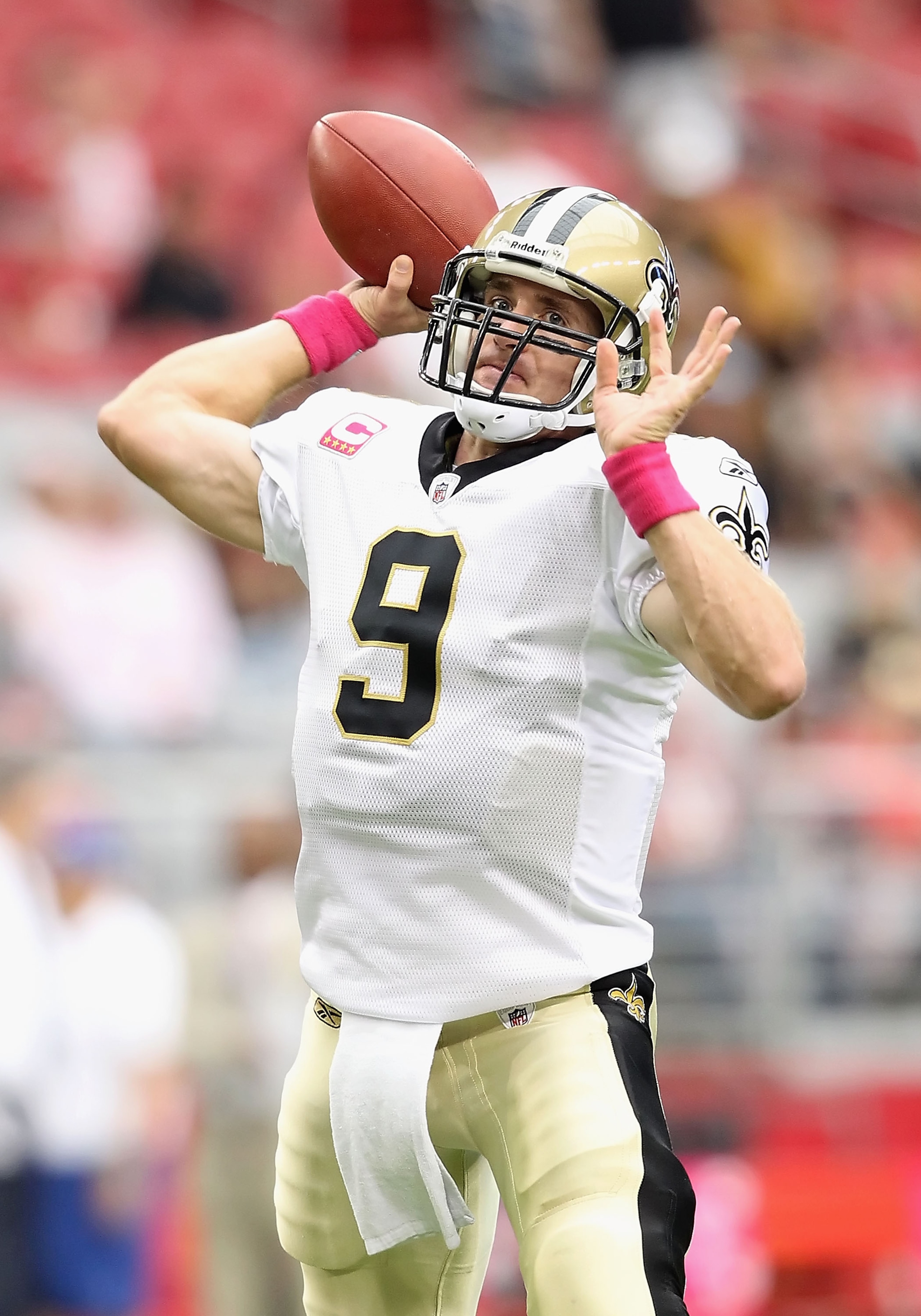 GLENDALE, AZ - OCTOBER 10:  Quarterback Drew Brees #9 of the New Orleans Saints warms up before the NFL game against the Arizona Cardinals at the University of Phoenix Stadium on October 10, 2010 in Glendale, Arizona. The Cardinals defeated the Saints 30-