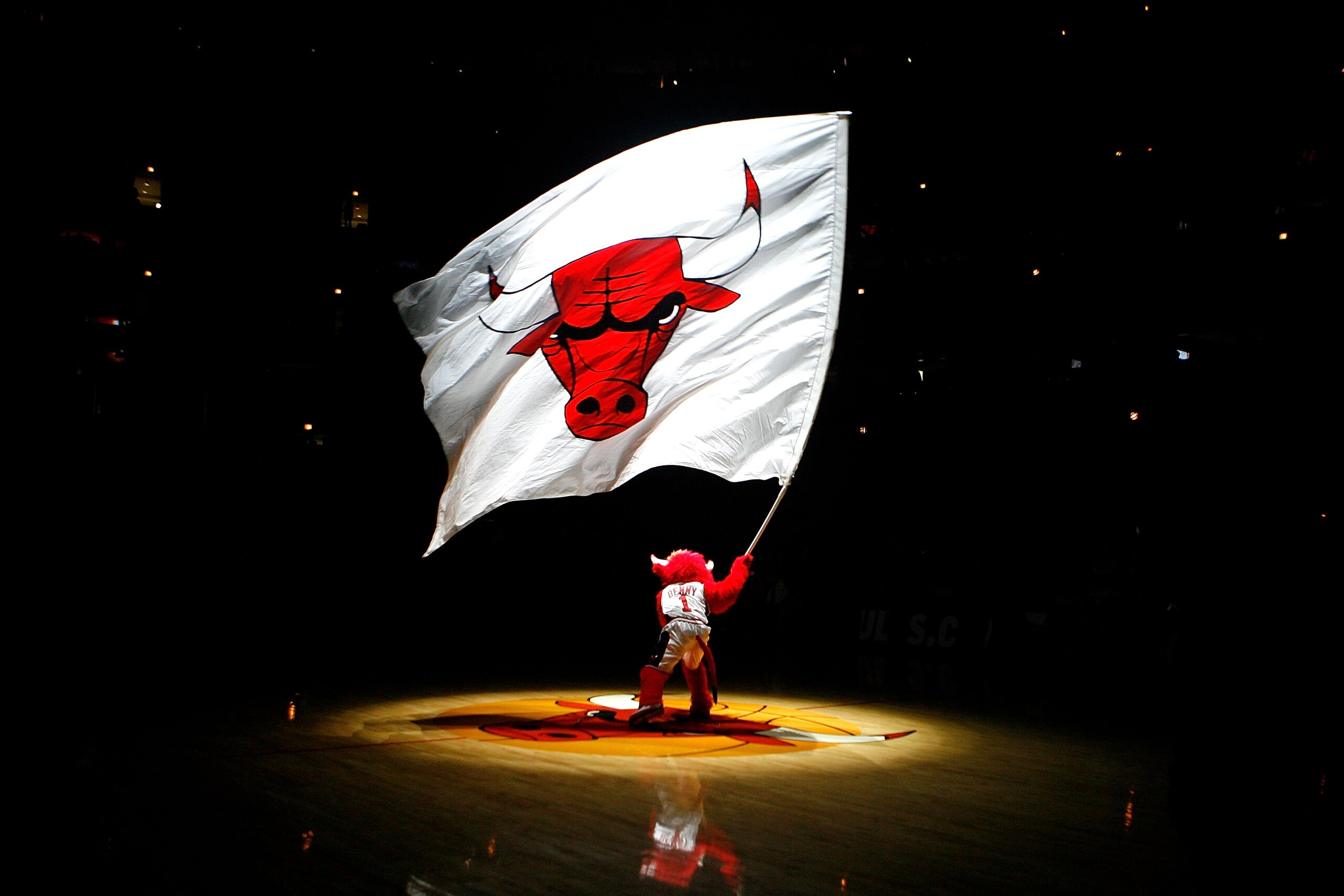 CHICAGO - DECEMBER 09:  Benny the Bull, mascot for the Chicago Bulls, waves a giant flag with the Bulls' logo on it during pregame festivities against the New York Knicks at the United Center on December 9, 2008 in Chicago, Illinois. NOTE TO USER: User ex