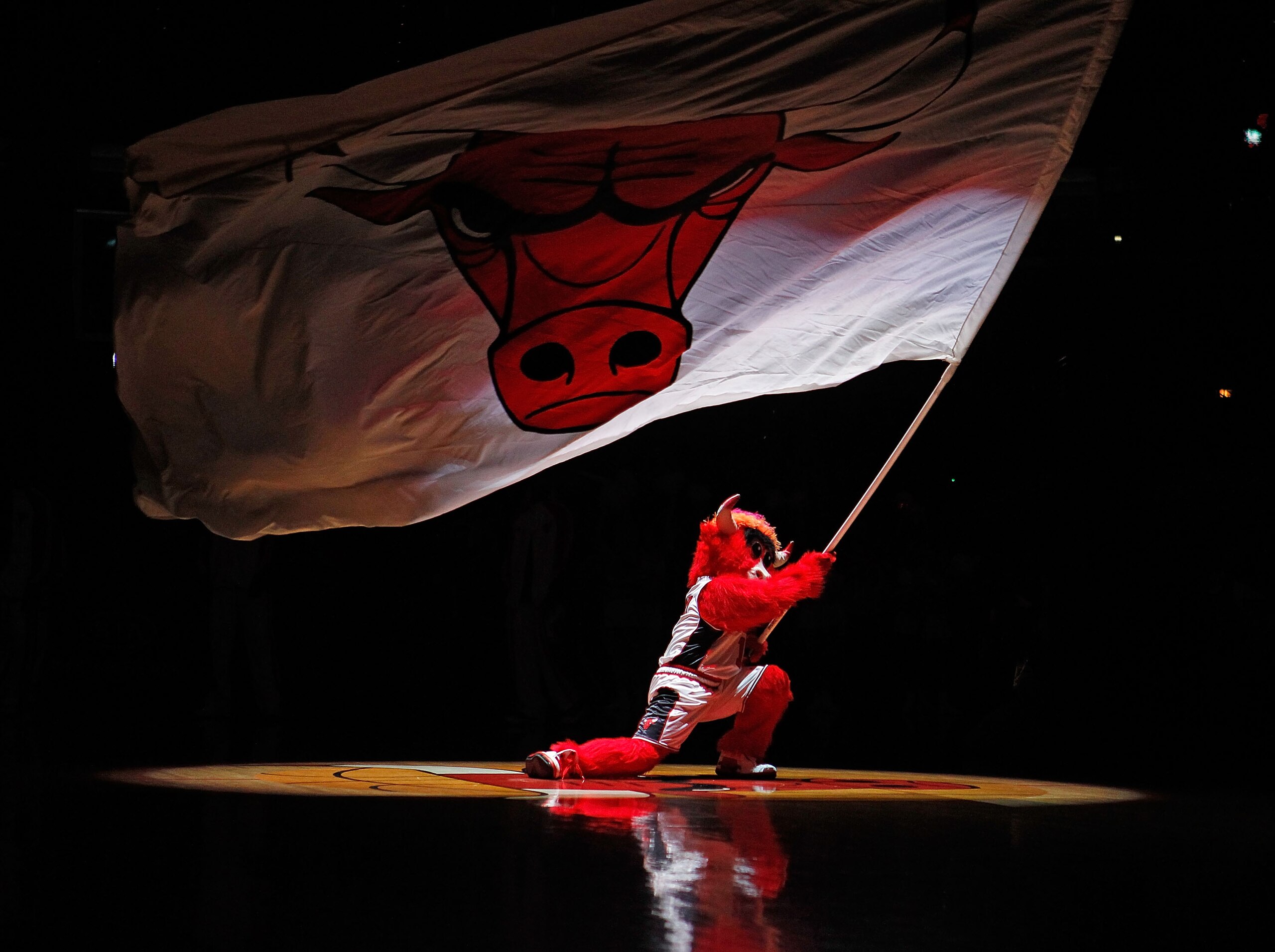 CHICAGO - MARCH 01: Benny, mascot of the Chicago Bulls, waves a flag during player introductions before a game between the Bulls and the Atlanta Hawks at the United Center on March 1, 2010 in Chicago, Illinois. NOTE TO USER: User expressly acknowledges an