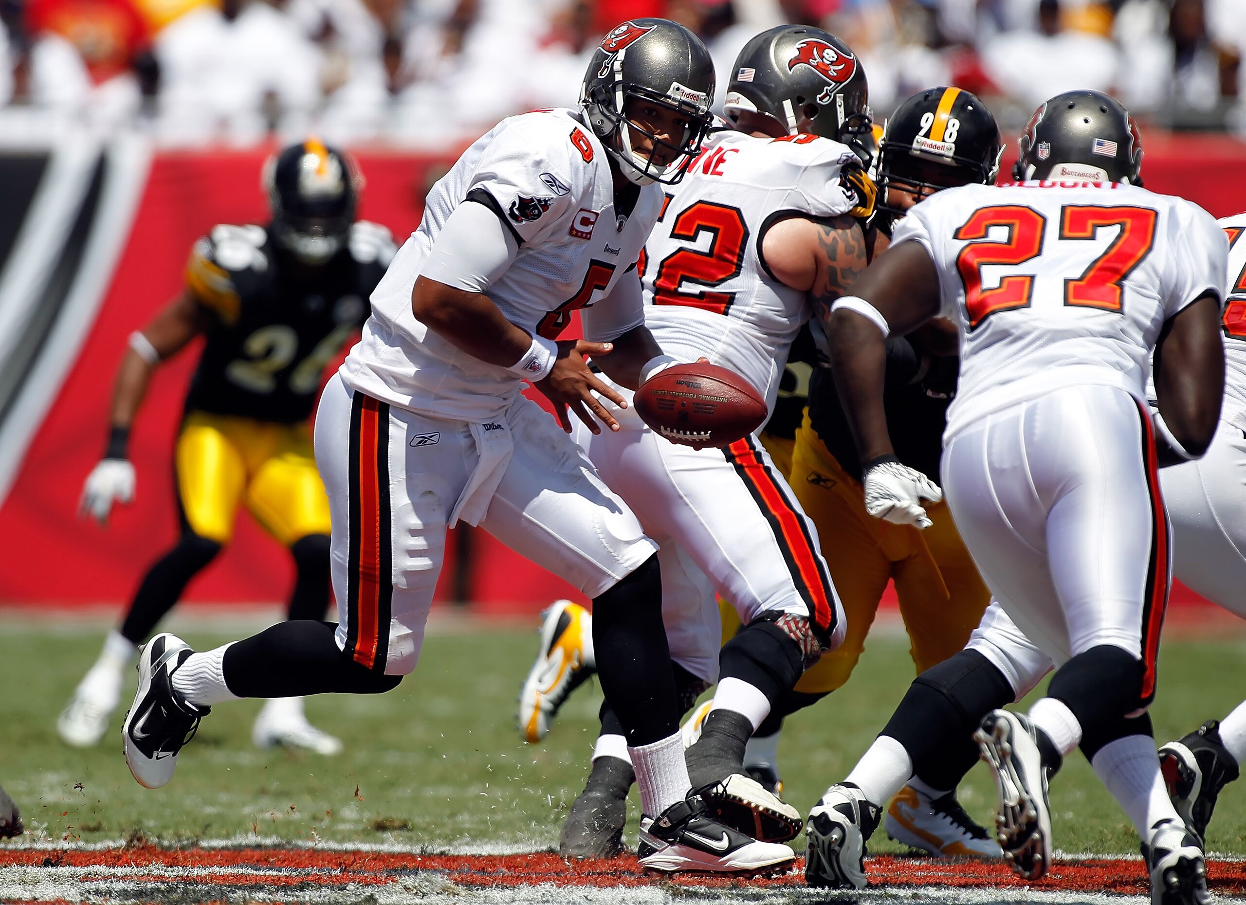 TAMPA, FL - SEPTEMBER 26:  Quarterback Josh Freeman #5 of the Tampa Bay Buccaneers hands the ball off against the Pittsburgh Steelers during the game at Raymond James Stadium on September 26, 2010 in Tampa, Florida.  (Photo by J. Meric/Getty Images)