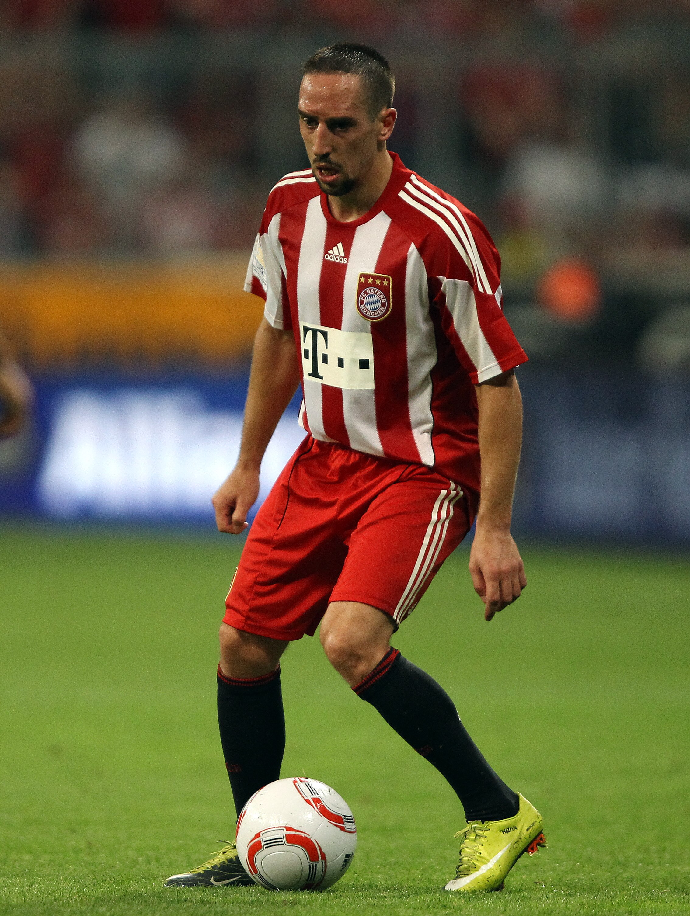 MUNICH, GERMANY - AUGUST 20:  Franck Ribery of Bayern runs with the ball during the Bundesliga match between FC Bayern Muenchen and VfL Wolfsburg at Allianz Arena on August 20, 2010 in Munich, Germany.  (Photo by Clive Brunskill/Getty Images)