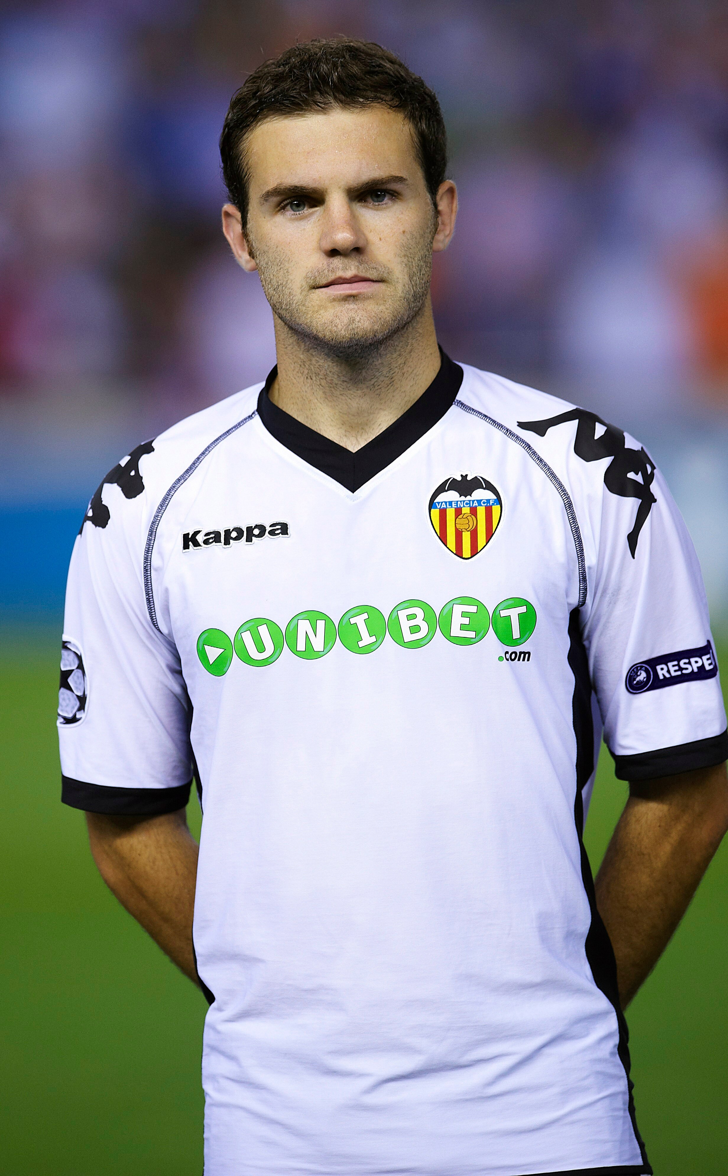 VALENCIA, SPAIN - SEPTEMBER 29:  Juan Mata of Valencia looks on before the UEFA Champions League group C match between Valencia and Manchester United on September 29, 2010 in Valencia, Spain. Manchester United won 1-0.  (Photo by Manuel Queimadelos Alonso