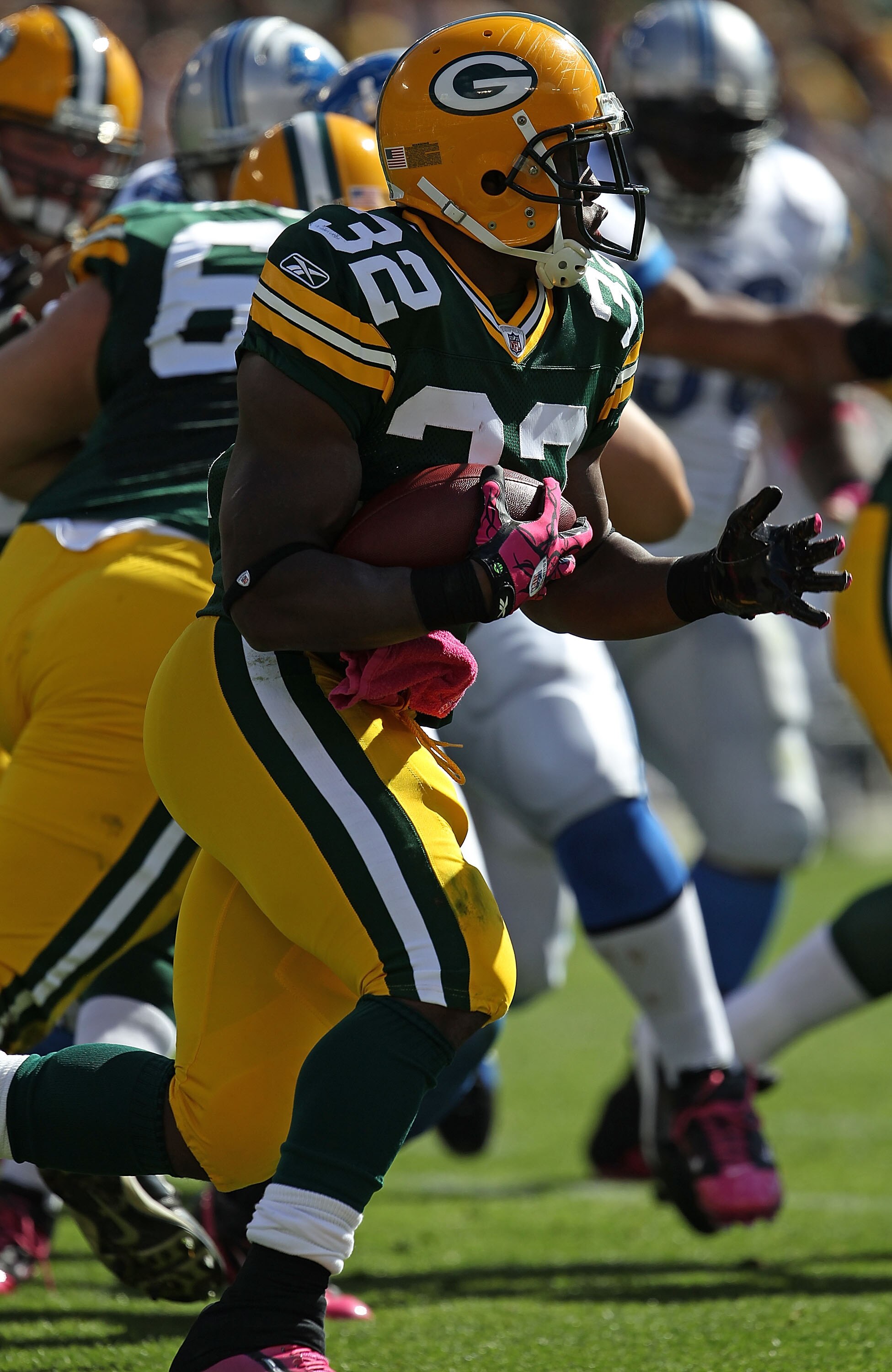 GREEN BAY, WI - OCTOBER 03: Brandon Jackson #32 of the Green Bay Packers rushes against the Detroit Lions at Lambeau Field on October 3, 2010 in Green Bay, Wisconsin. The Packers defeated the Lions 28-26. (Photo by Jonathan Daniel/Getty Images)