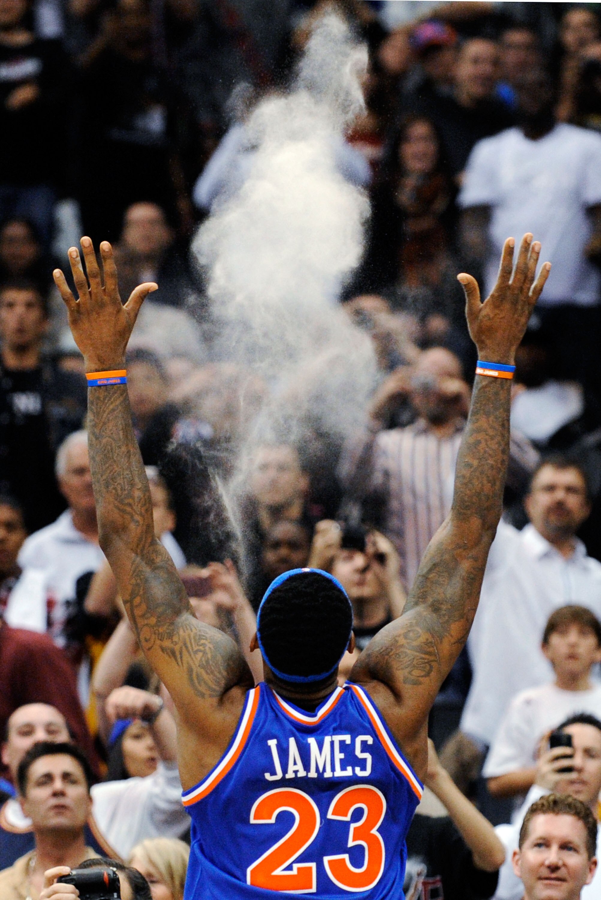 LOS ANGELES, CA - JANUARY 16:  LeBron James #23  of the Cleveland Caveliers throws powder in the air before the start of the NBA basketball game against Los Angeles Clippers at Staples Center on January 16, 2010 in Los Angeles, California. NOTE TO USER: U
