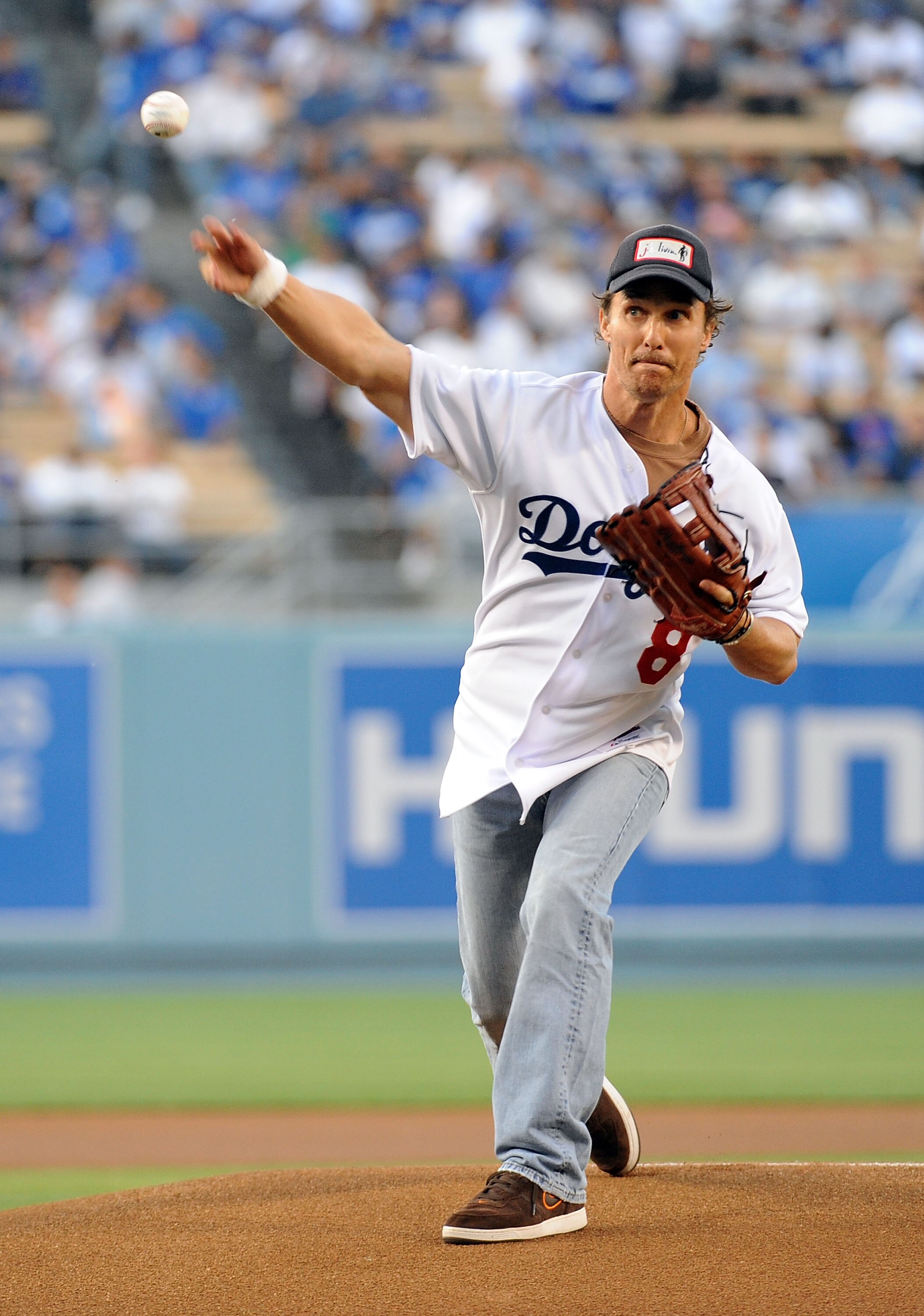 LOS ANGELES, CA - MAY 20:  Actor Matthew McConaughey throws the ceremonial first pitch before the game between the New York Mets and Los Angeles Dodgers at Dodger Stadium May 20, 2009 in Los Angeles, California.  (Photo by Harry How/Getty Images)