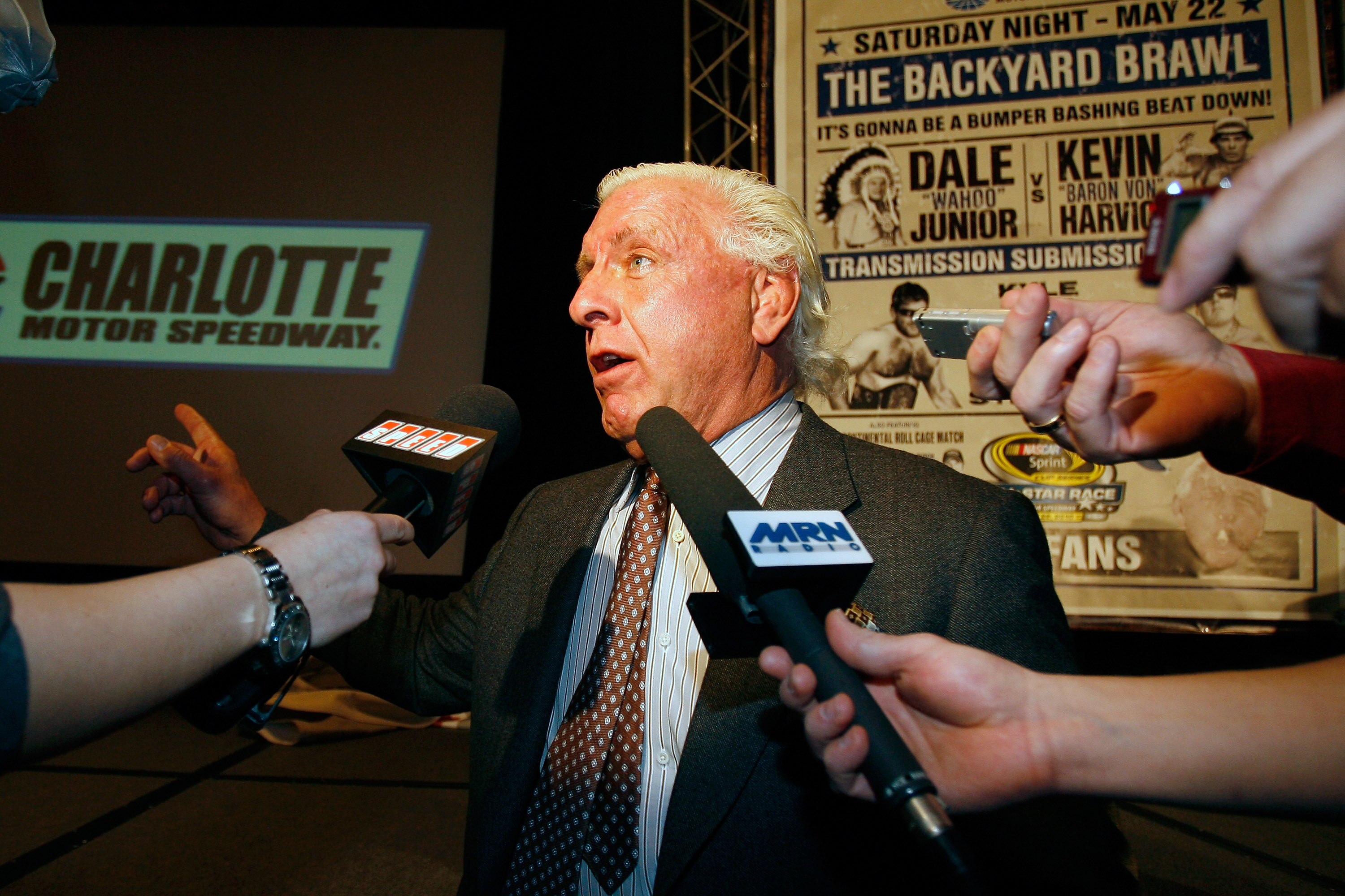 CONCORD, NC - JANUARY 20:  Former American Professional Wrestler Ric Flair speaks with the media during the NASCAR Sprint Media Tour hosted by Charlotte Motor Speedway, held at the Embassy Suites, on January 20, 2010 in Concord, North Carolina.  (Photo by